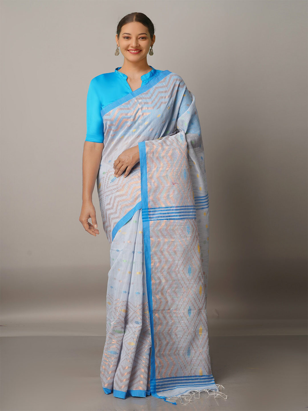 

Unnati Silks Grey Melange & Blue Woven Design Zari Silk Cotton Jamdani Saree