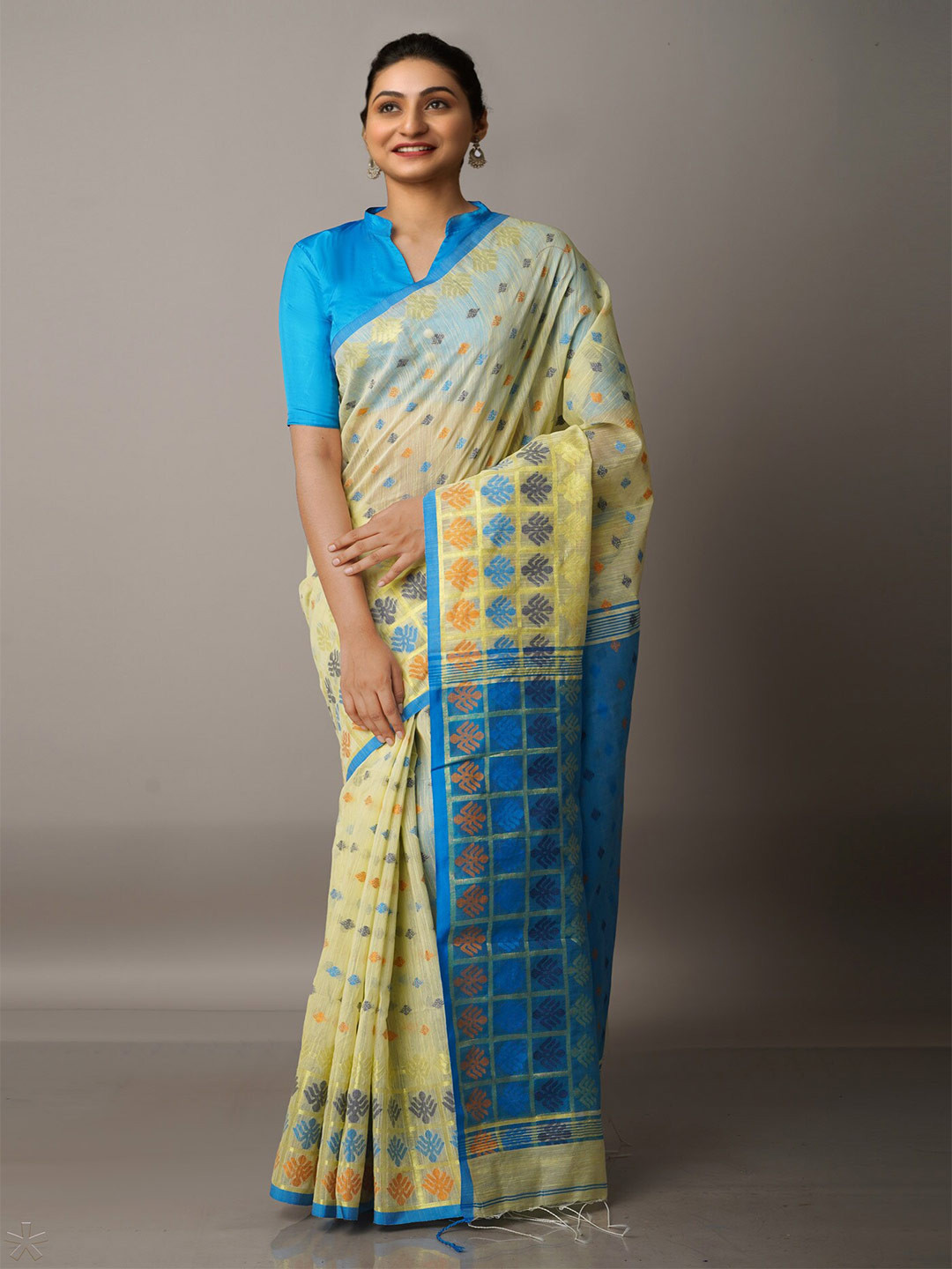 

Unnati Silks Green & Blue Woven Design Zari Silk Cotton Jamdani Saree