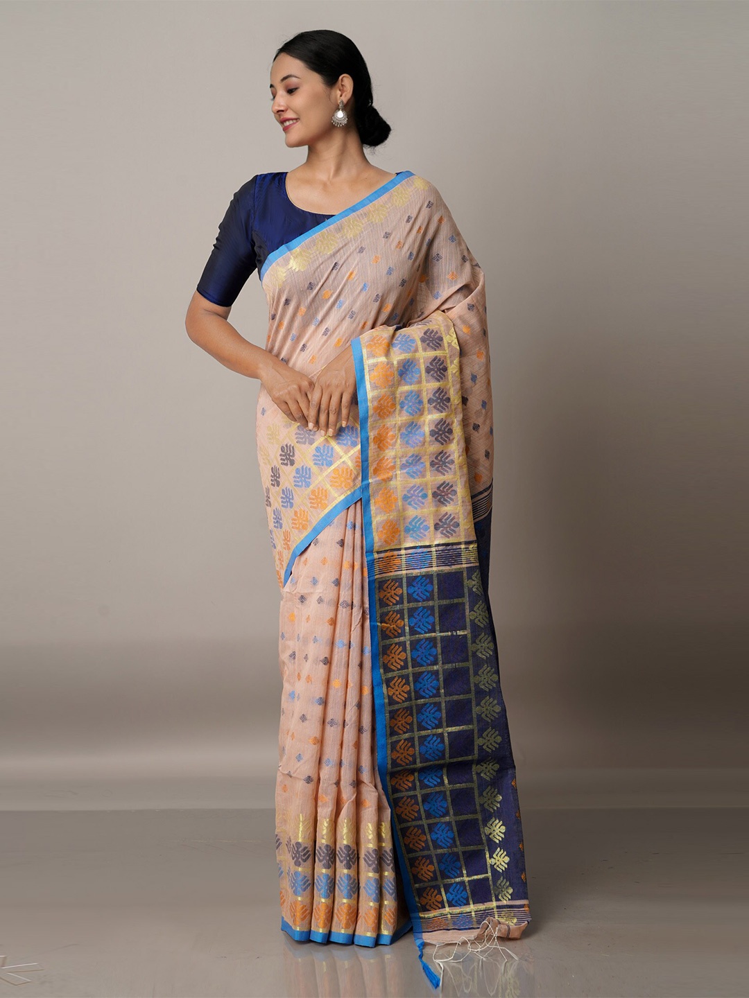 

Unnati Silks Champagne & Blue Ethnic Motifs Zari Silk Cotton Handloom Jamdani Saree