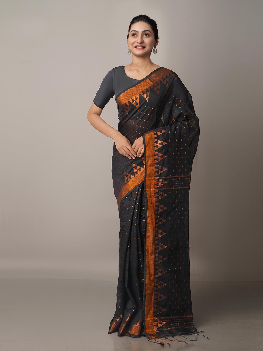 

Unnati Silks Black & Orange Zari Linen Blend Jamdani Saree