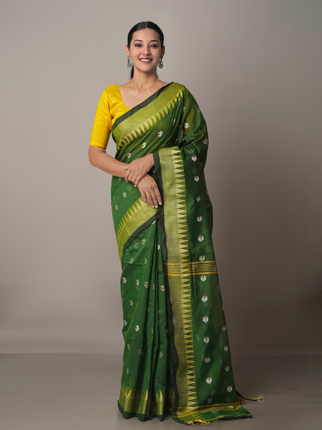 

Unnati Silks Green & White Woven Design Zari Silk Cotton Jamdani Saree