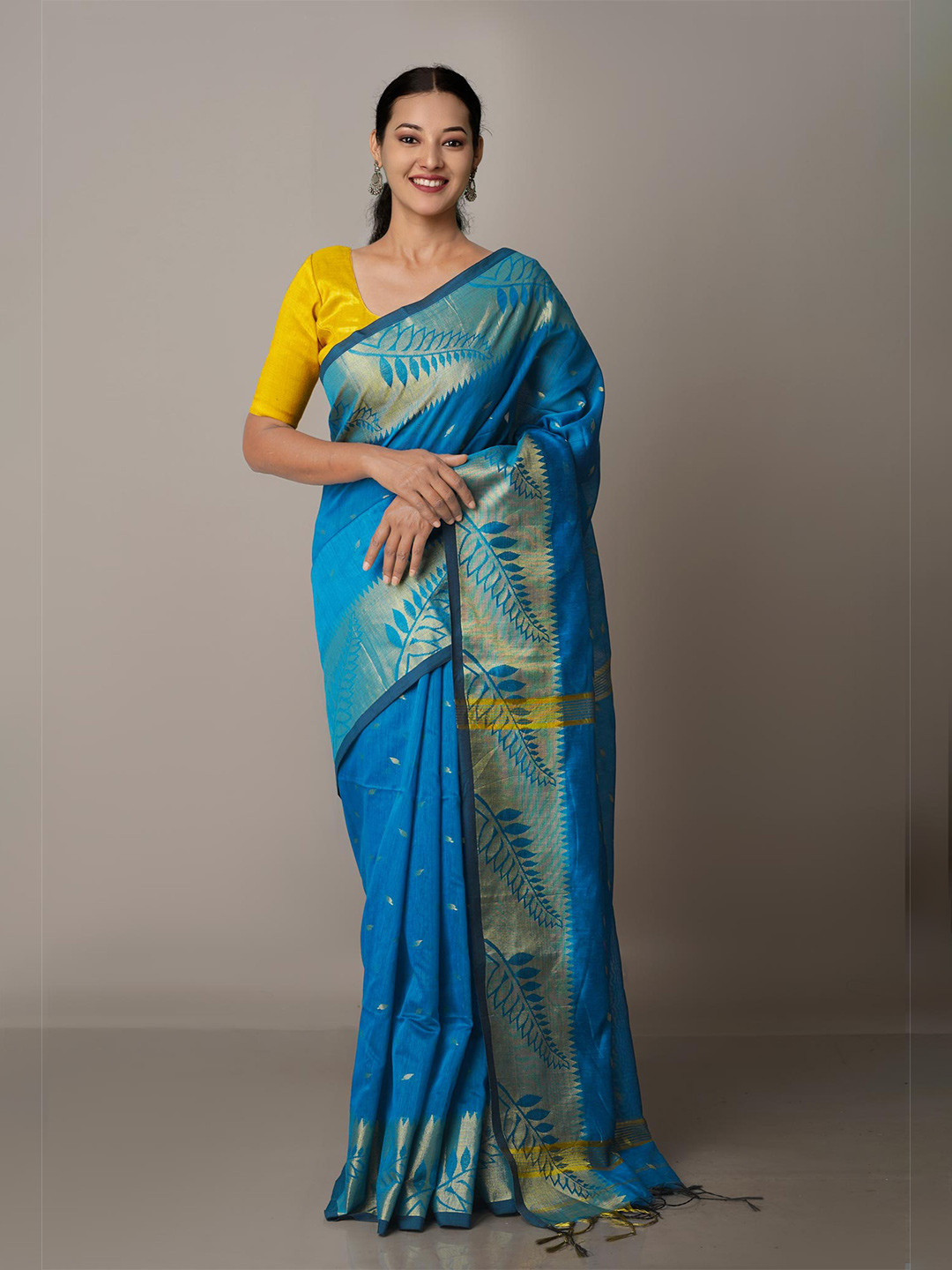 

Unnati Silks Blue & Gold-Toned Woven Design Zari Silk Cotton Jamdani Saree