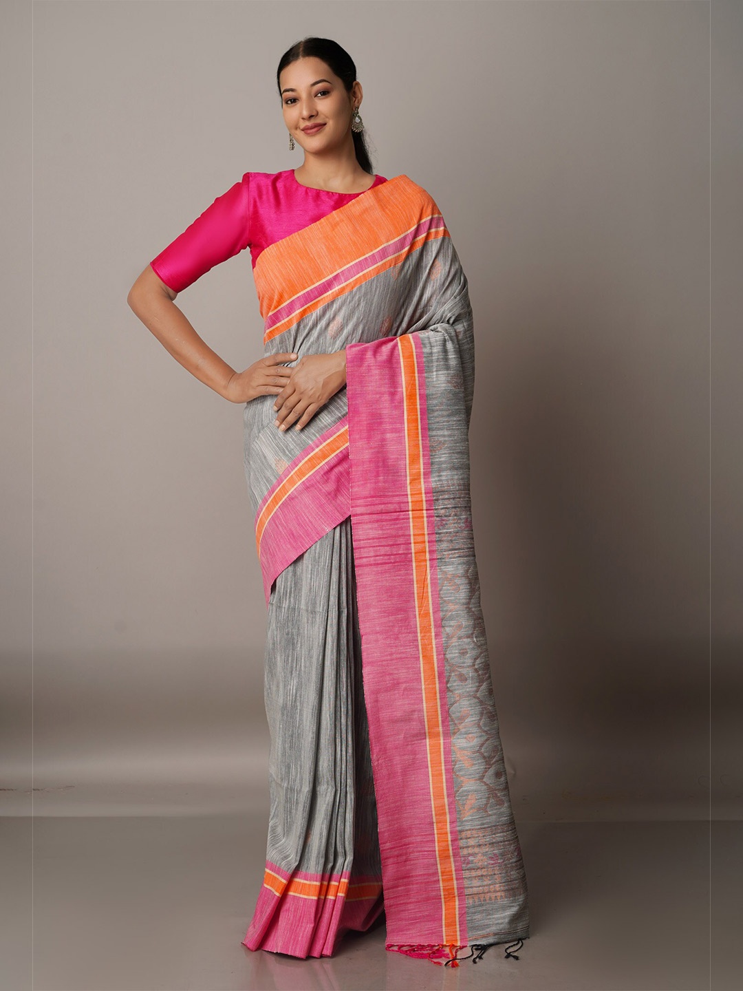 

Unnati Silks Grey & Yellow Woven Design Silk Cotton Jamdani Saree