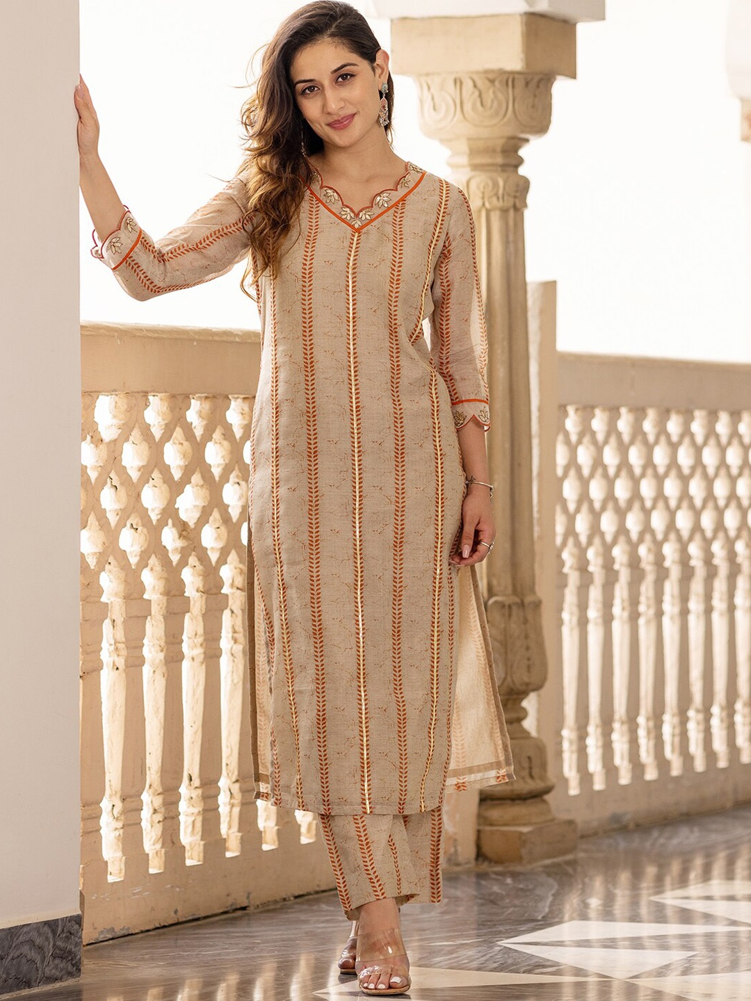 

Ambraee Women Beige Ethnic Motifs Printed Chanderi Cotton Kurta with Trouser Set