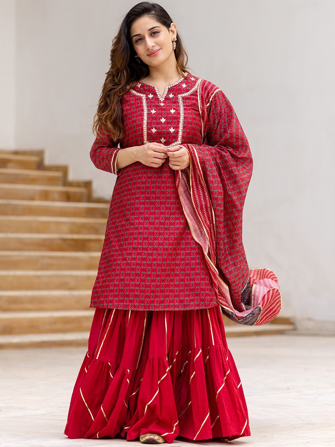 

Ambraee Women Red Floral Printed Kurta with Sharara & Dupatta
