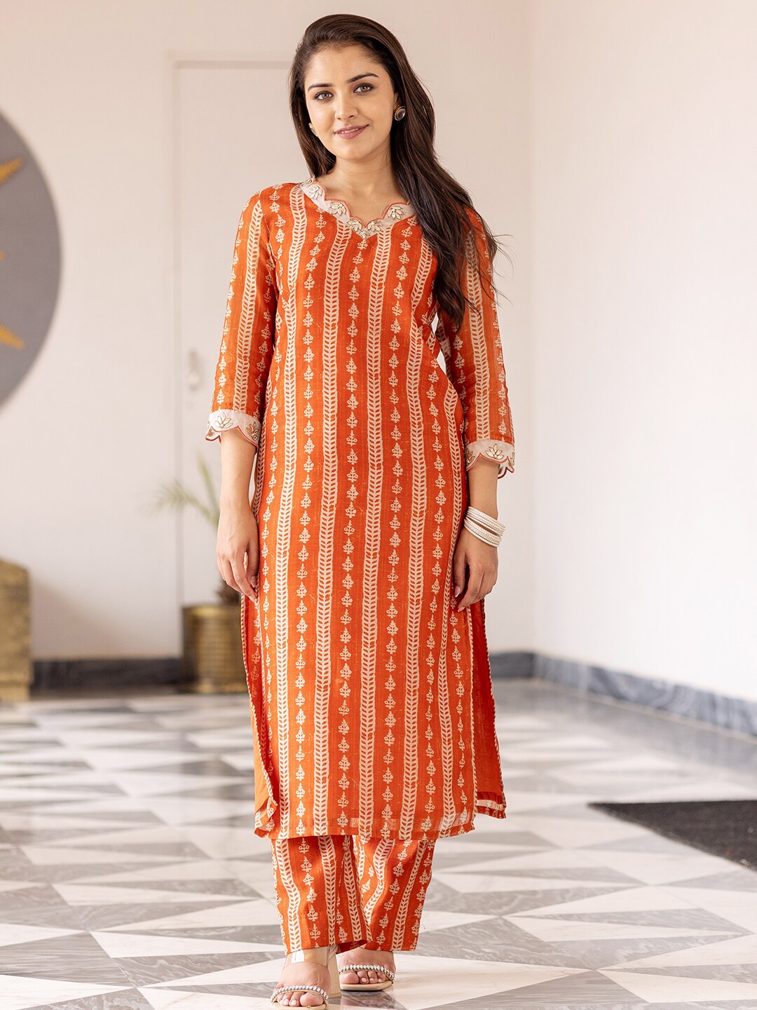 

Ambraee Women Orange Ethnic Motifs Printed Chanderi Cotton Kurta with Trouser Set