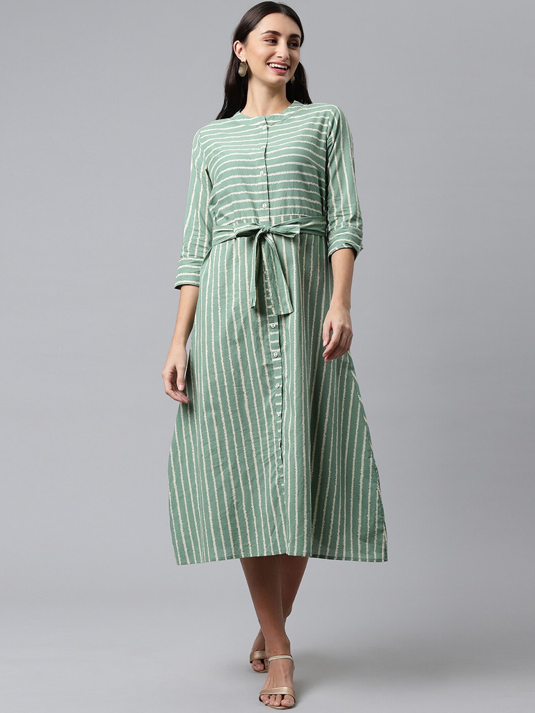 

HERE&NOW Women Green Cotton Printed Cotton Fit & Flared Dresses