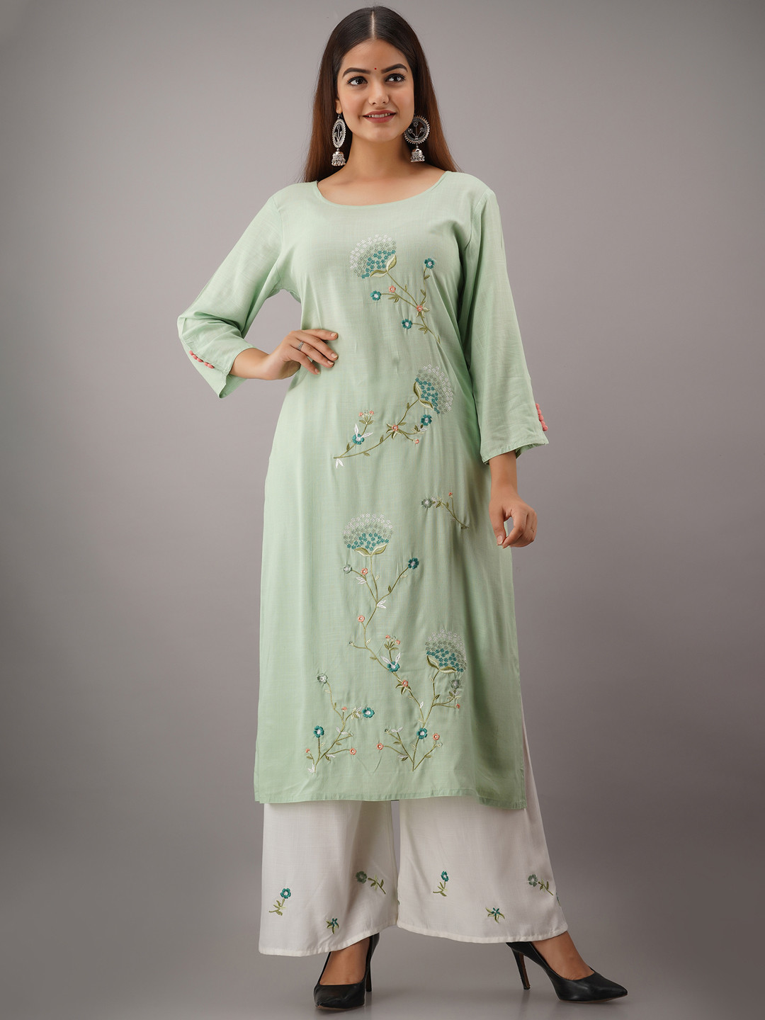 

OMASK Women Green Embroidered Kurta with Palazzos