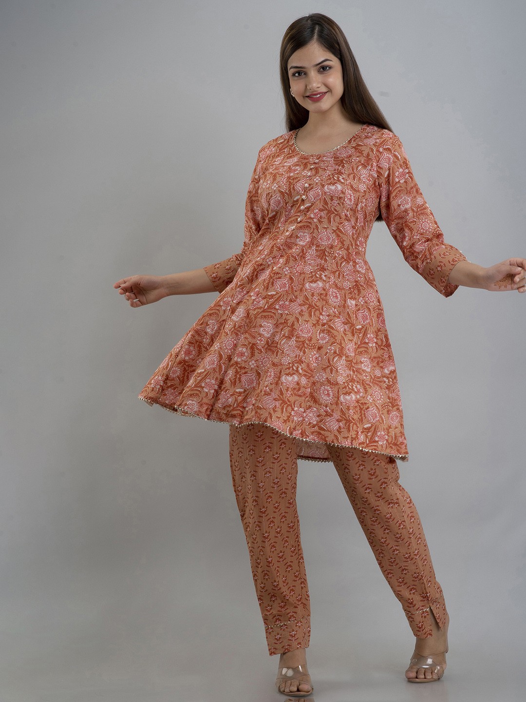 

OMASK Women Rust Floral Printed Panelled Gotta Patti Pure Cotton Kurti with Trousers