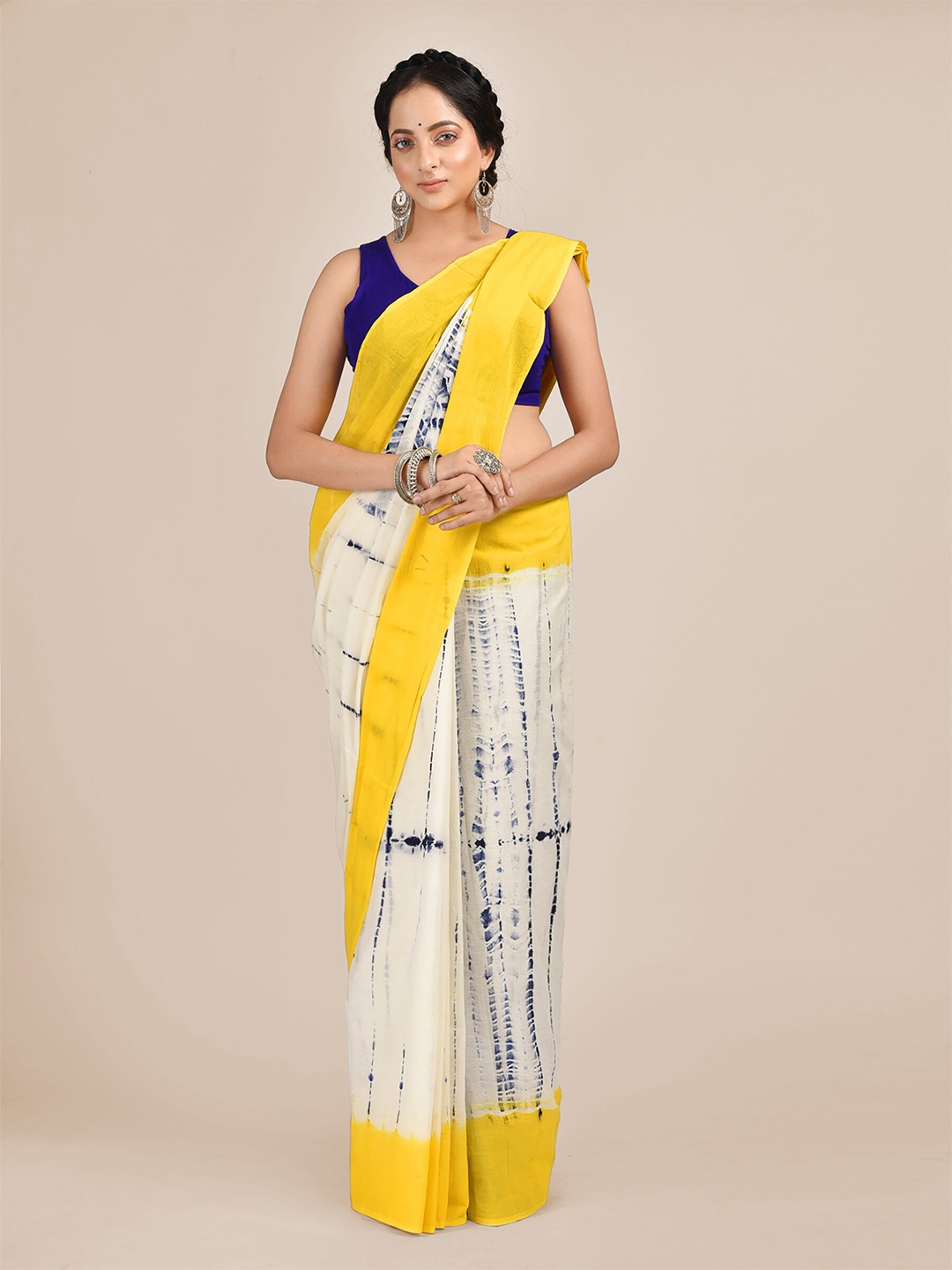 

Mitera White & Yellow Pure Cotton Bagru Saree