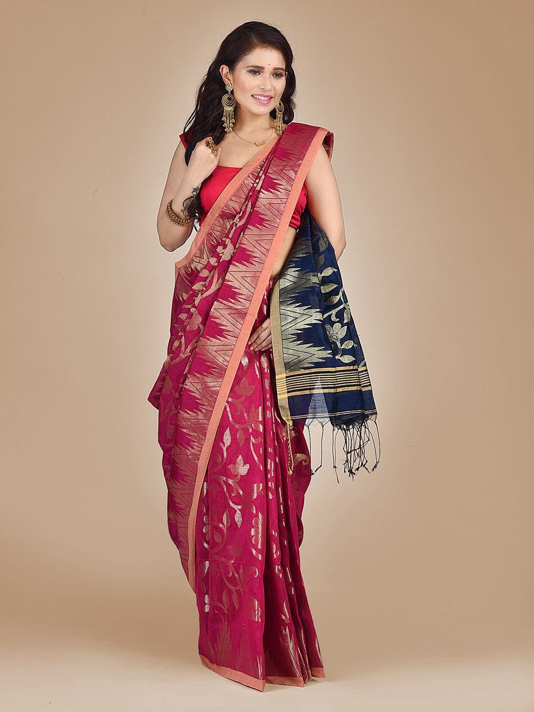 

Mitera Magenta & Blue Ethnic Motifs Zari Saree