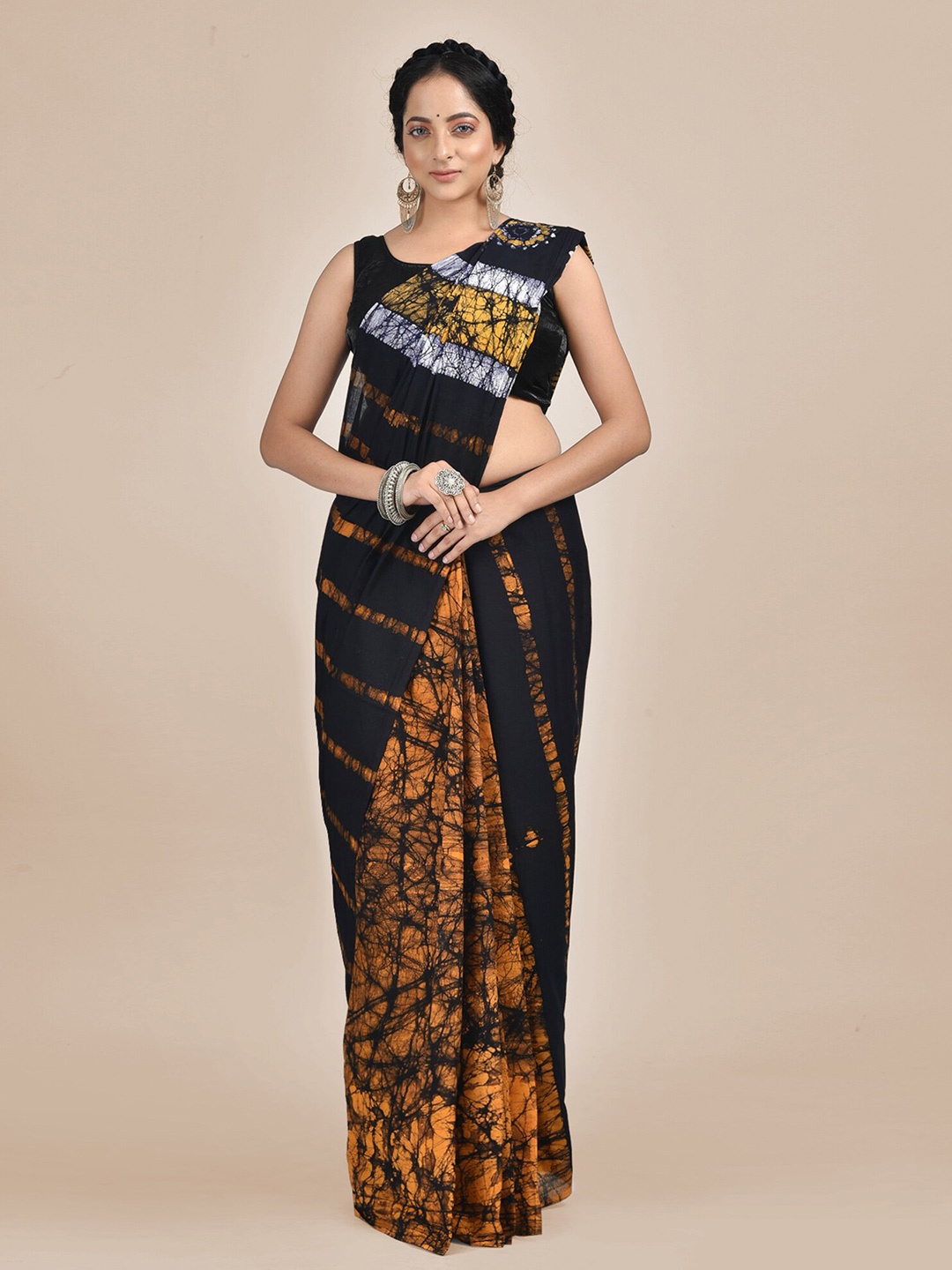 

Mitera Black & Mustard Batik Pure Cotton Saree