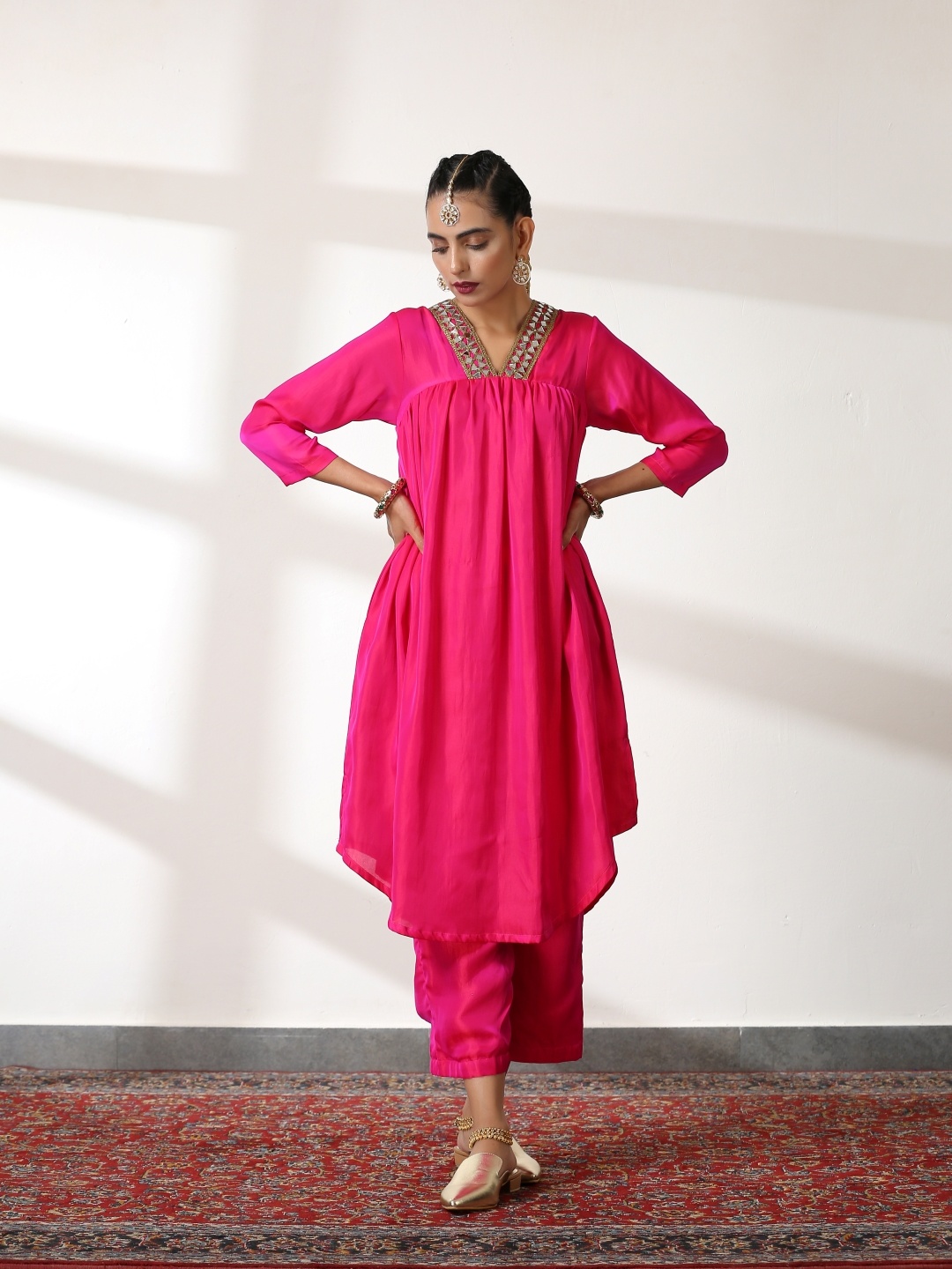 

Swtantra Women Fuchsia Yoke Design Pleated Mirror Work Kurta with Trousers