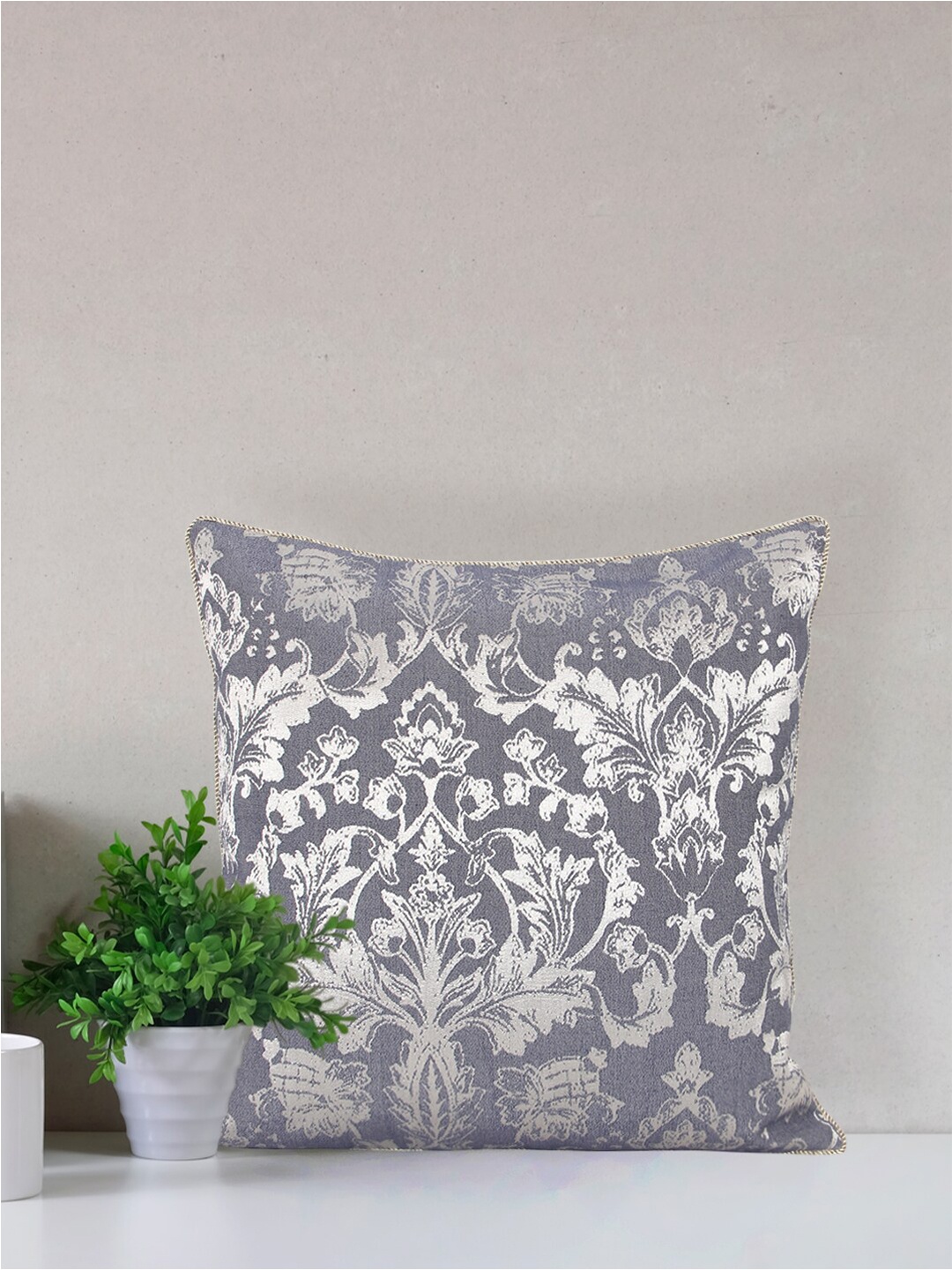 

Home Blue & Silver-Toned Printed Self Design Square Cushion Covers