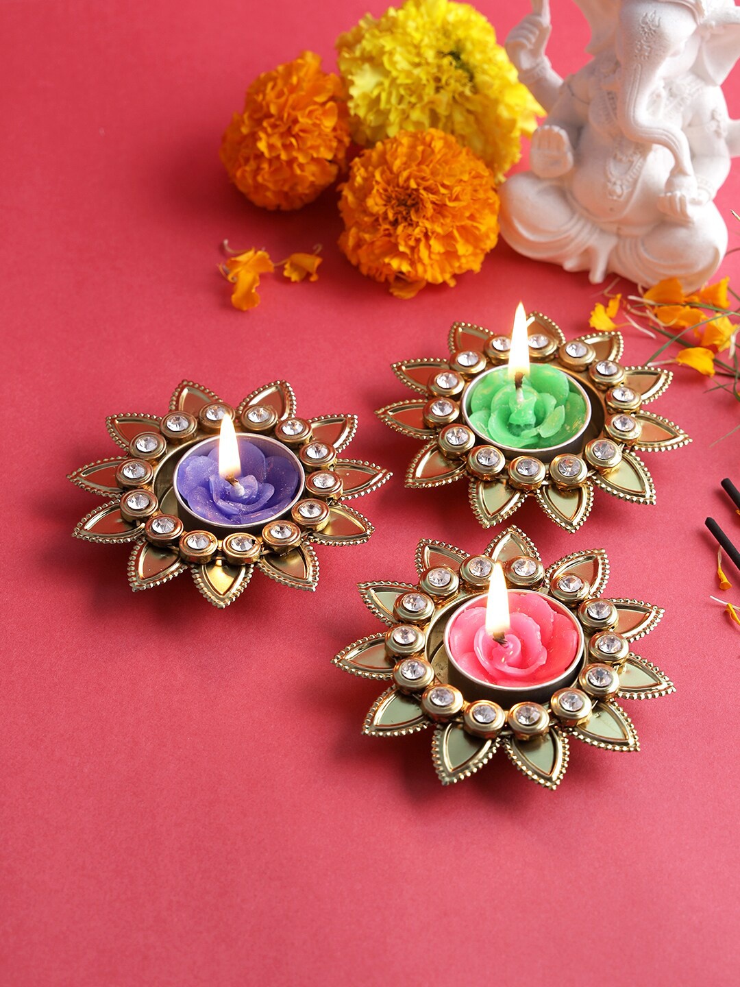 

Aapno Rajasthan Set Of 3 Gold-Toned Stone Work Diyas