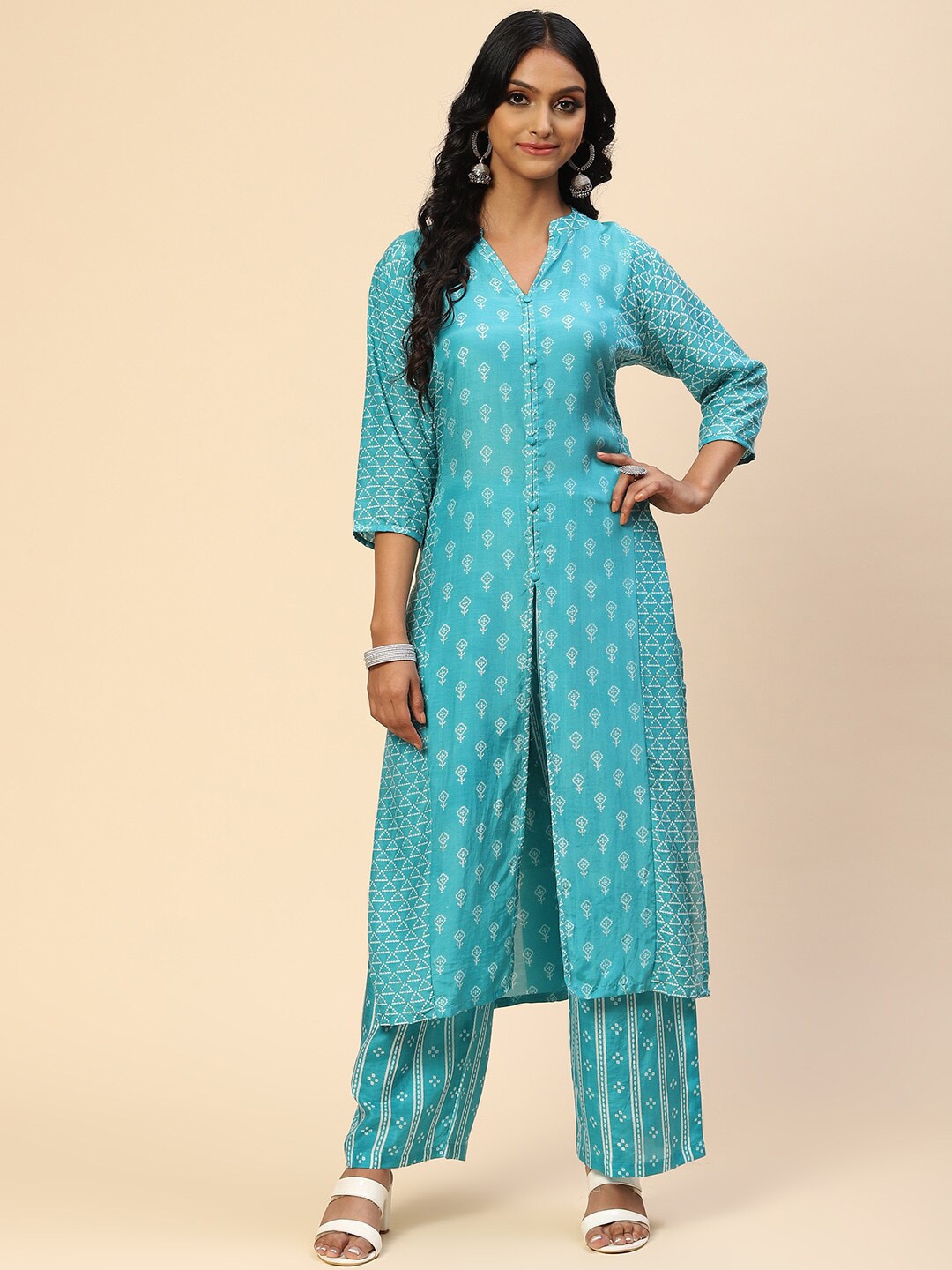 

Meena Bazaar Women Teal Floral Printed Dupion Silk Kurta with Palazzos