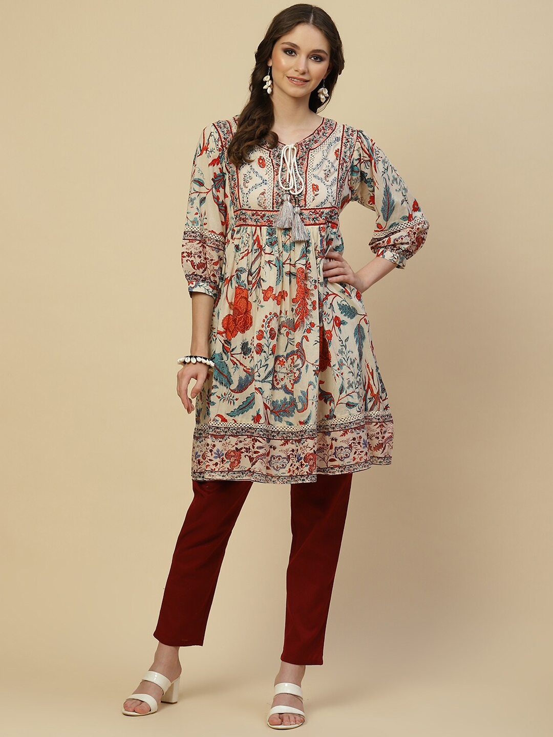 

Meena Bazaar Women Cream-Coloured Floral Printed A-line Kurta