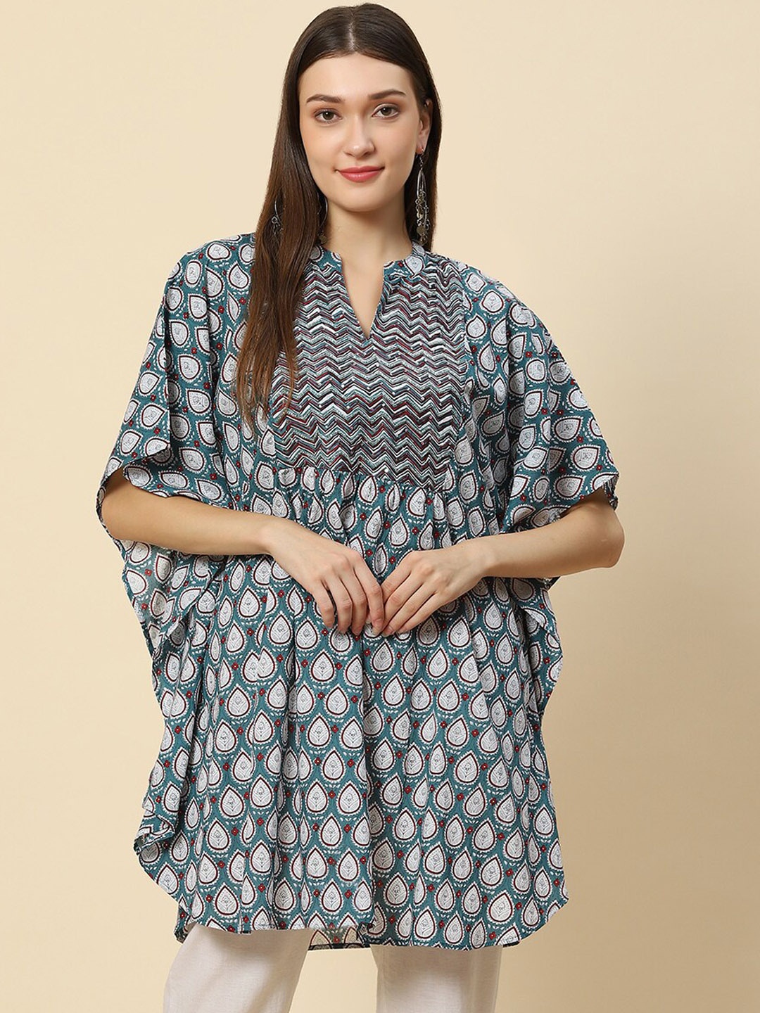 

Meena Bazaar Green Ethnic Motifs Printed Extended Sleeves Pure Cotton Kaftan Kurti
