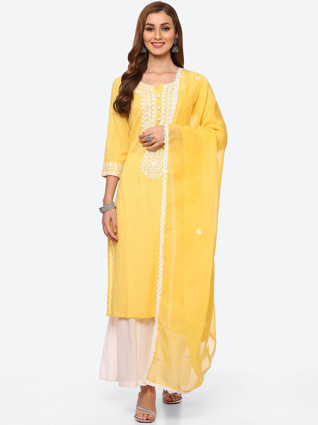 

Meena Bazaar Women Yellow Floral Embroidered Thread Work Pure Cotton Kurta with Sharara & With Dupatta