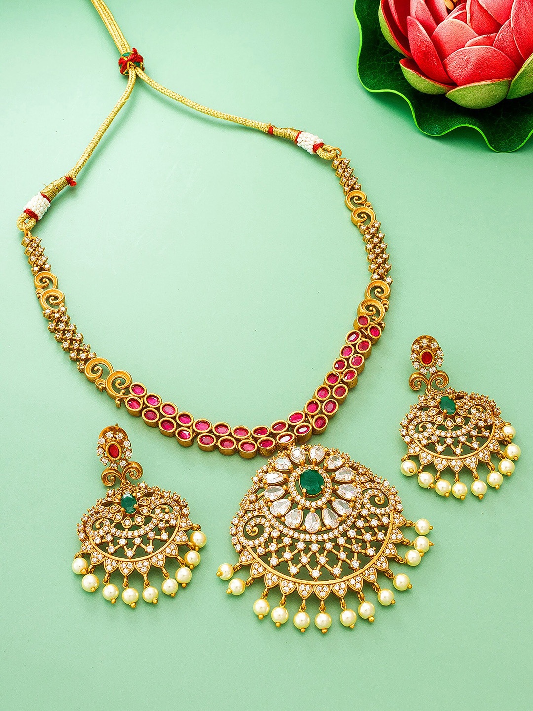 

aadita Women Gold-Plated Red & White Kundan Studded & Beads Jewellery Set