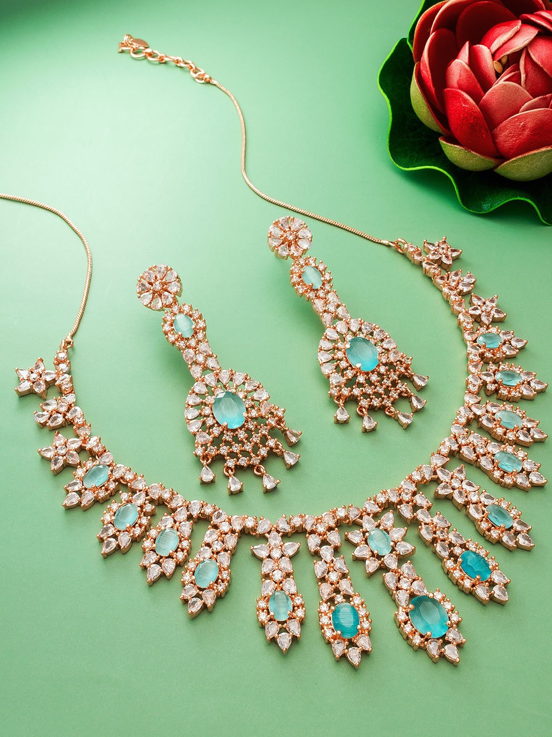 

aadita Gold-Plated Stone-Studded & Beaded Jewellery Set