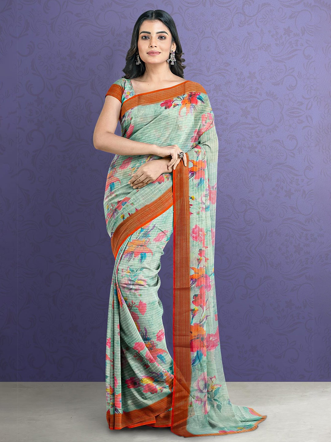 

Kalamandir Sea Green & Pink Floral Printed Zari Jute Silk Saree