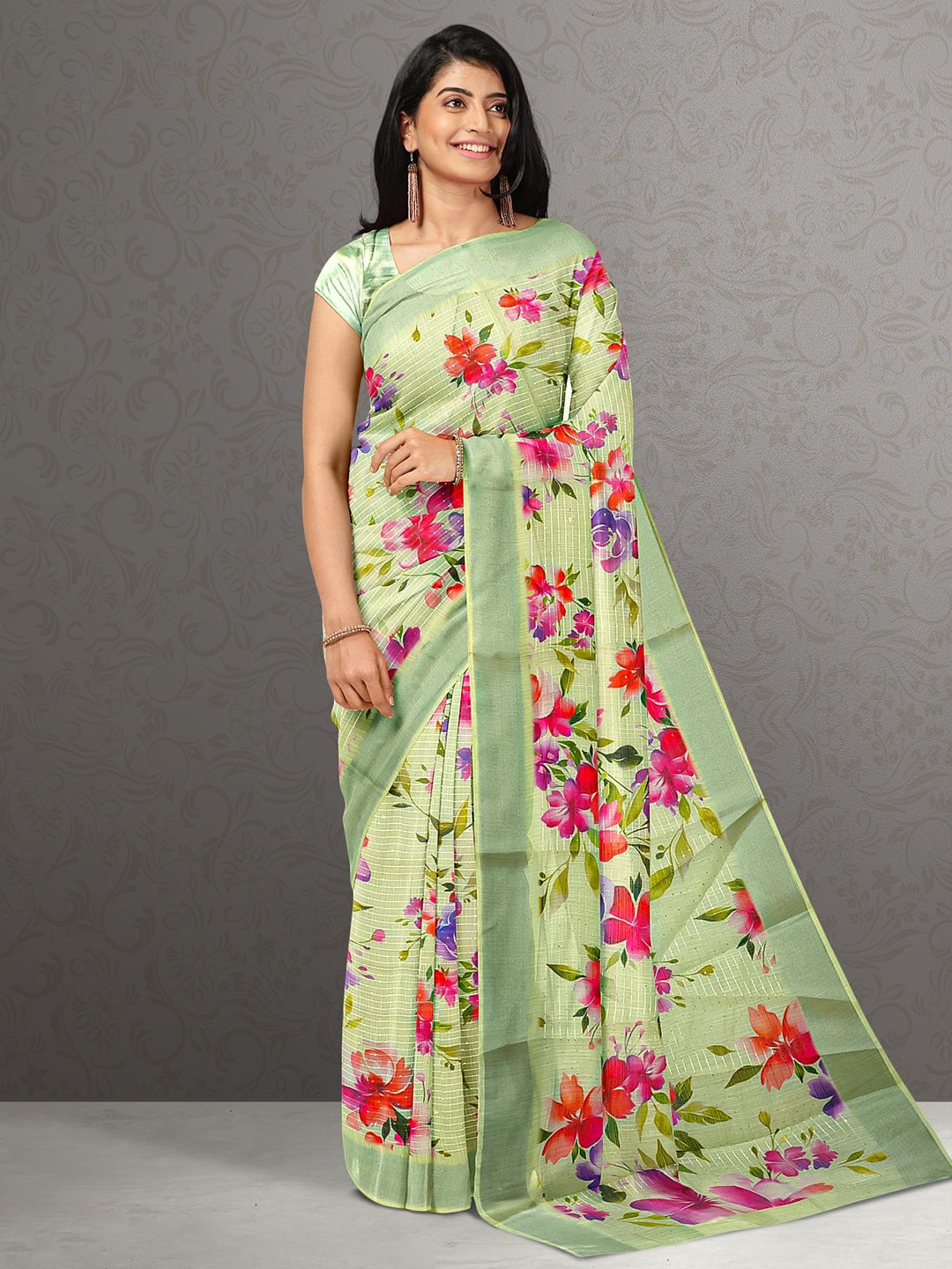 

Kalamandir Women Green & Pink Floral Jute Silk Saree