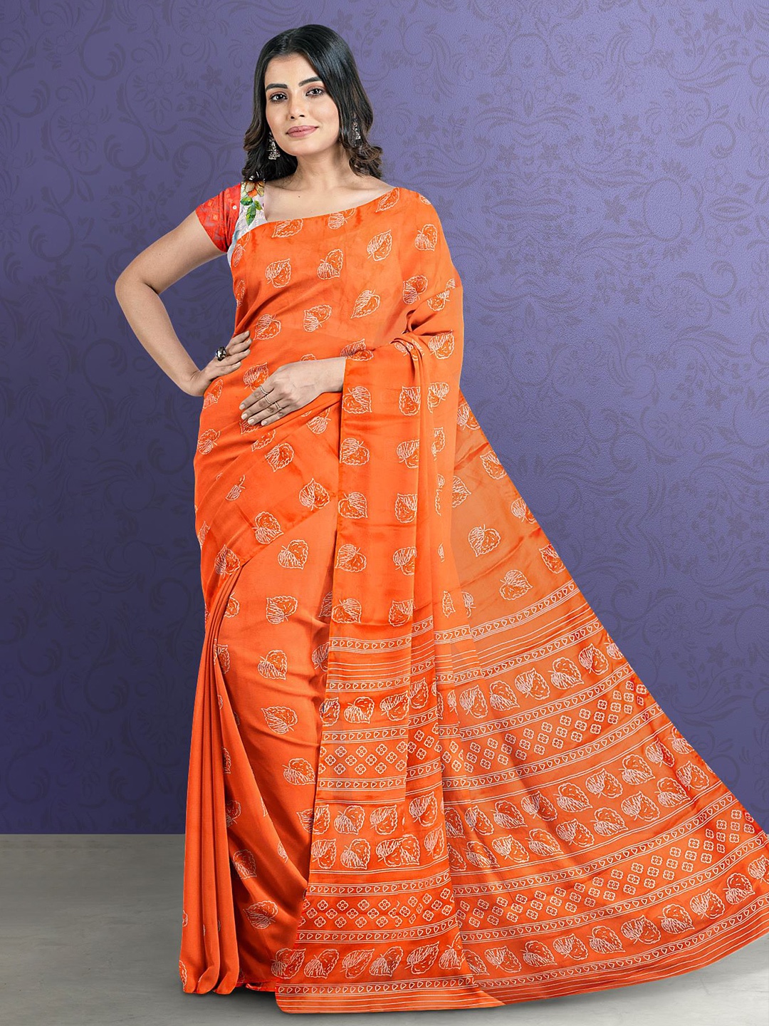 

Kalamandir Women Orange & White Floral Silk Blend Saree