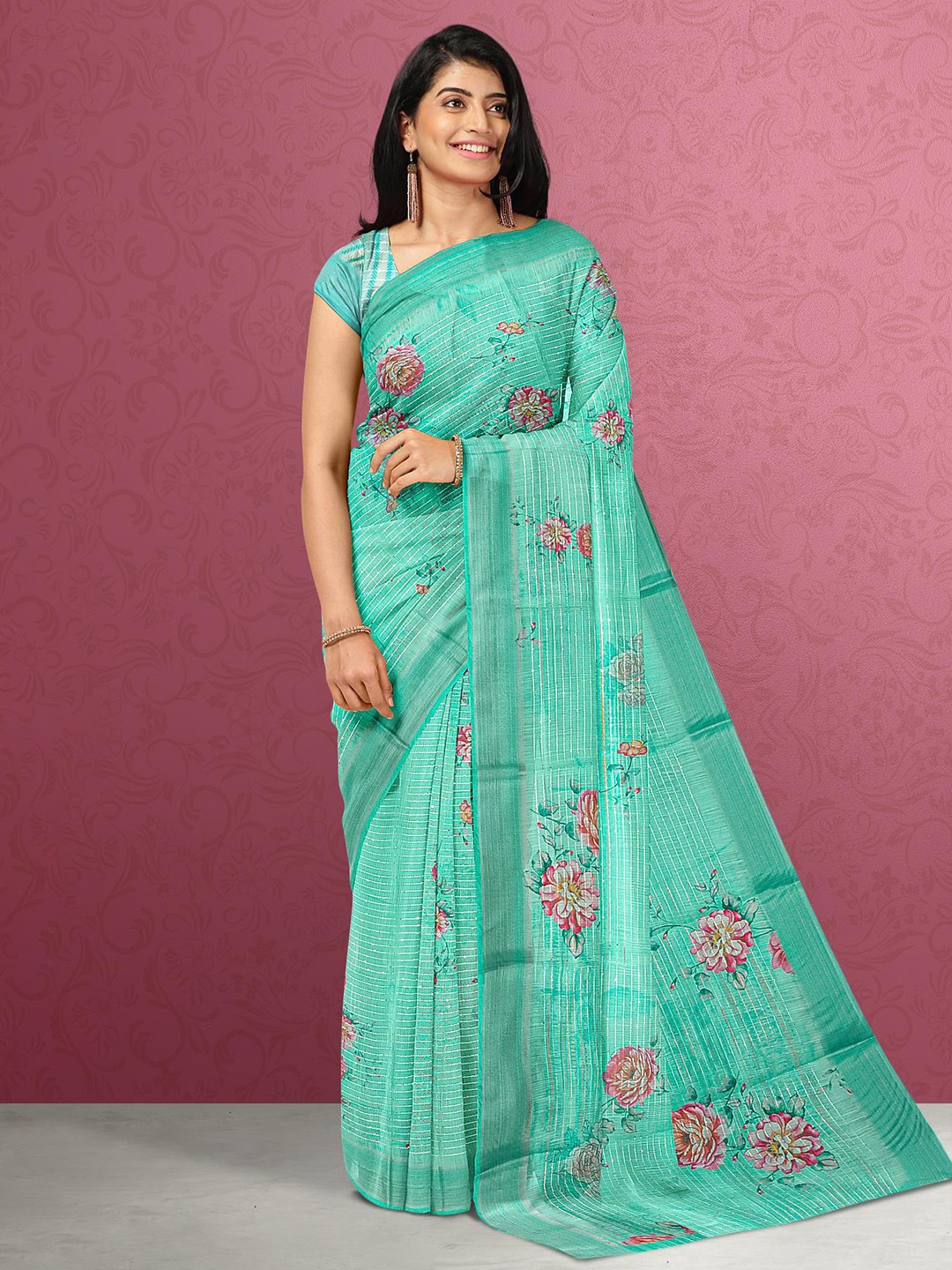 

Kalamandir Women Sea Green & Pink Floral Jute Silk Saree