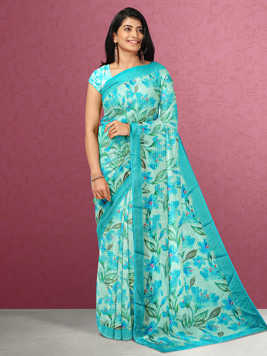 

Kalamandir Women Blue & Silver-Toned Floral Jute Silk Saree
