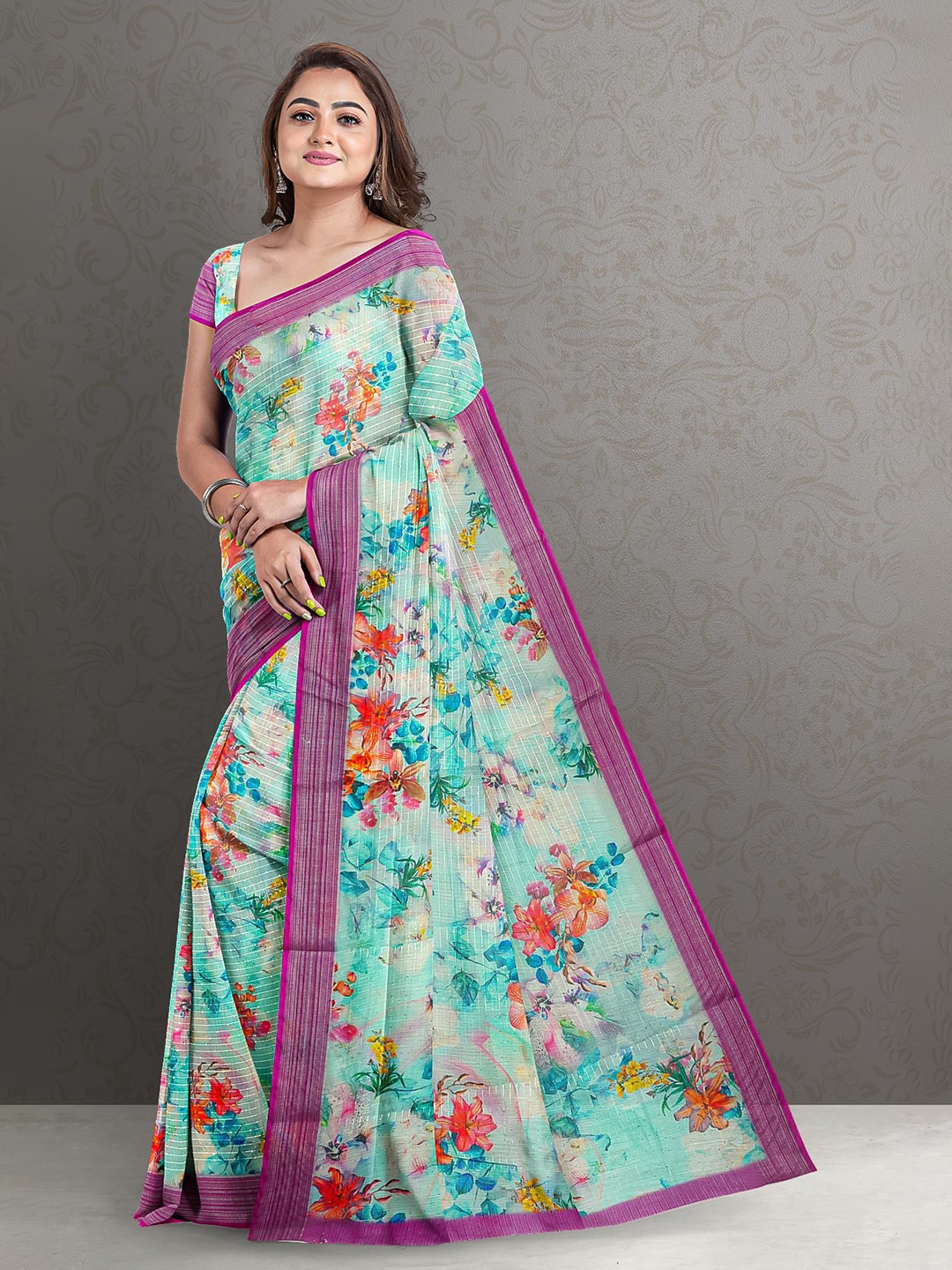 

Kalamandir Women Blue & Pink Floral Zari Jute Silk Saree