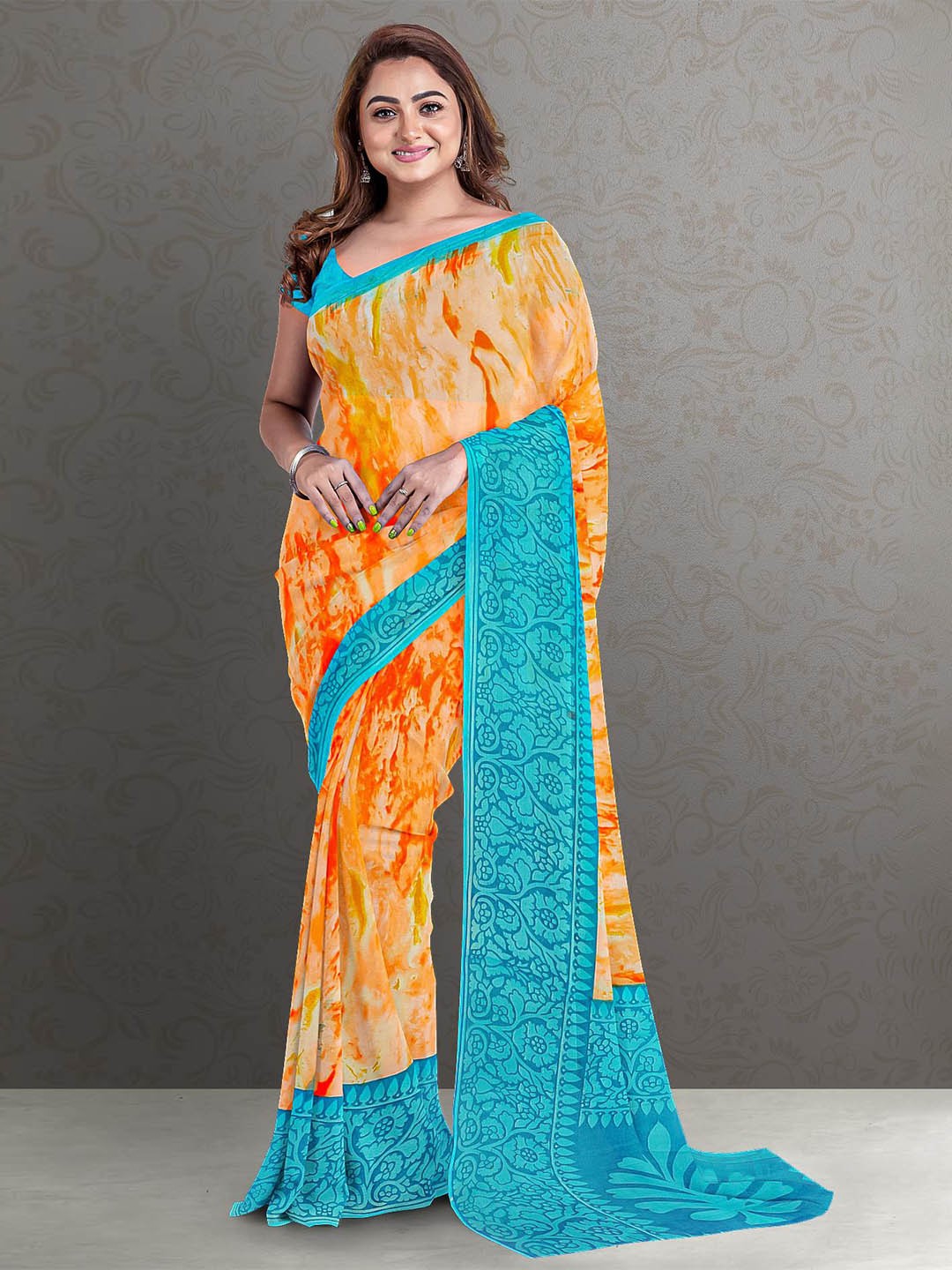 

Kalamandir Orange & Blue Silk Blend Saree