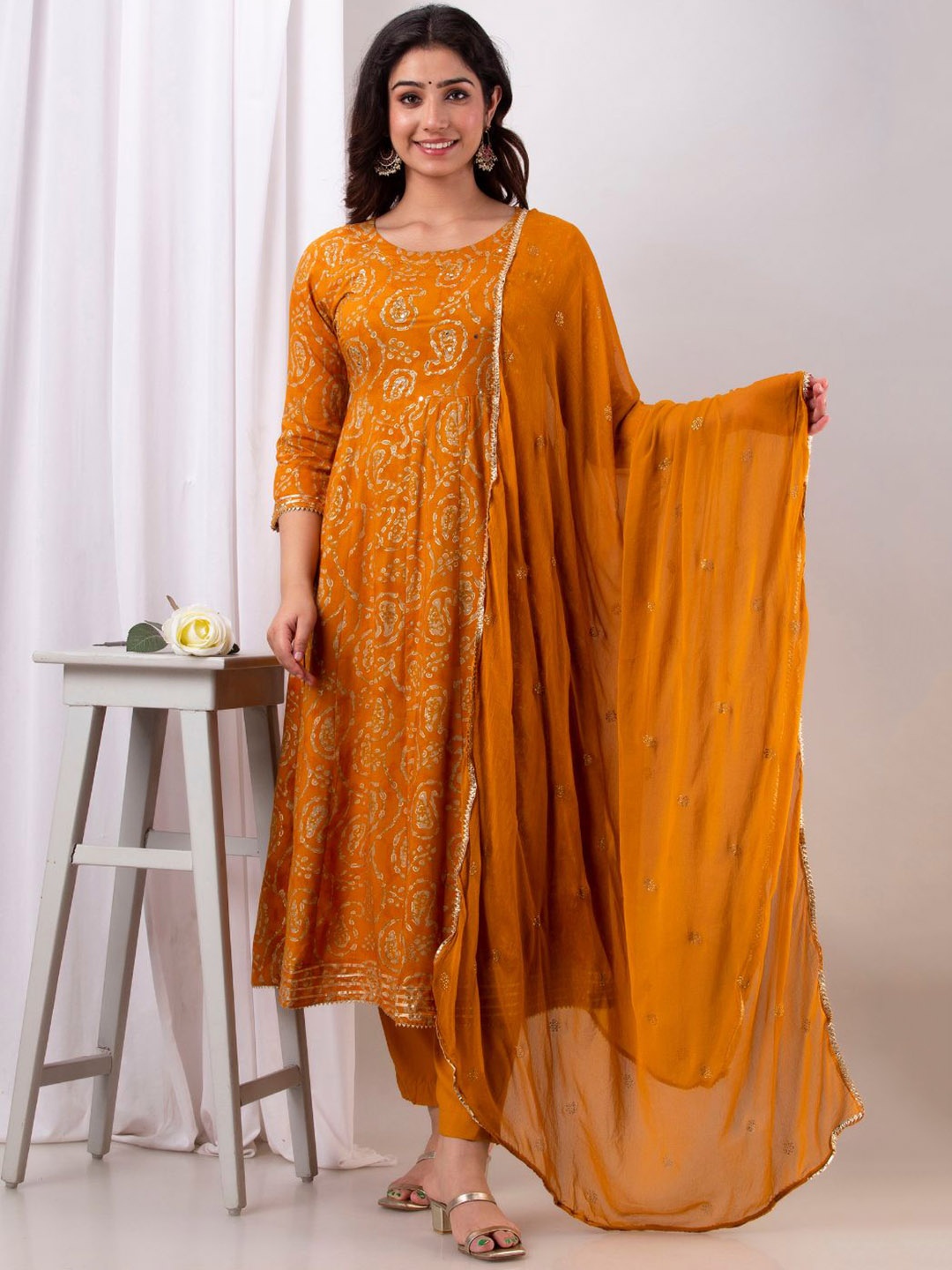 

Kesarya Women Yellow & Gold-Toned Paisley Printed Kurta with Trouser & Dupatta Set