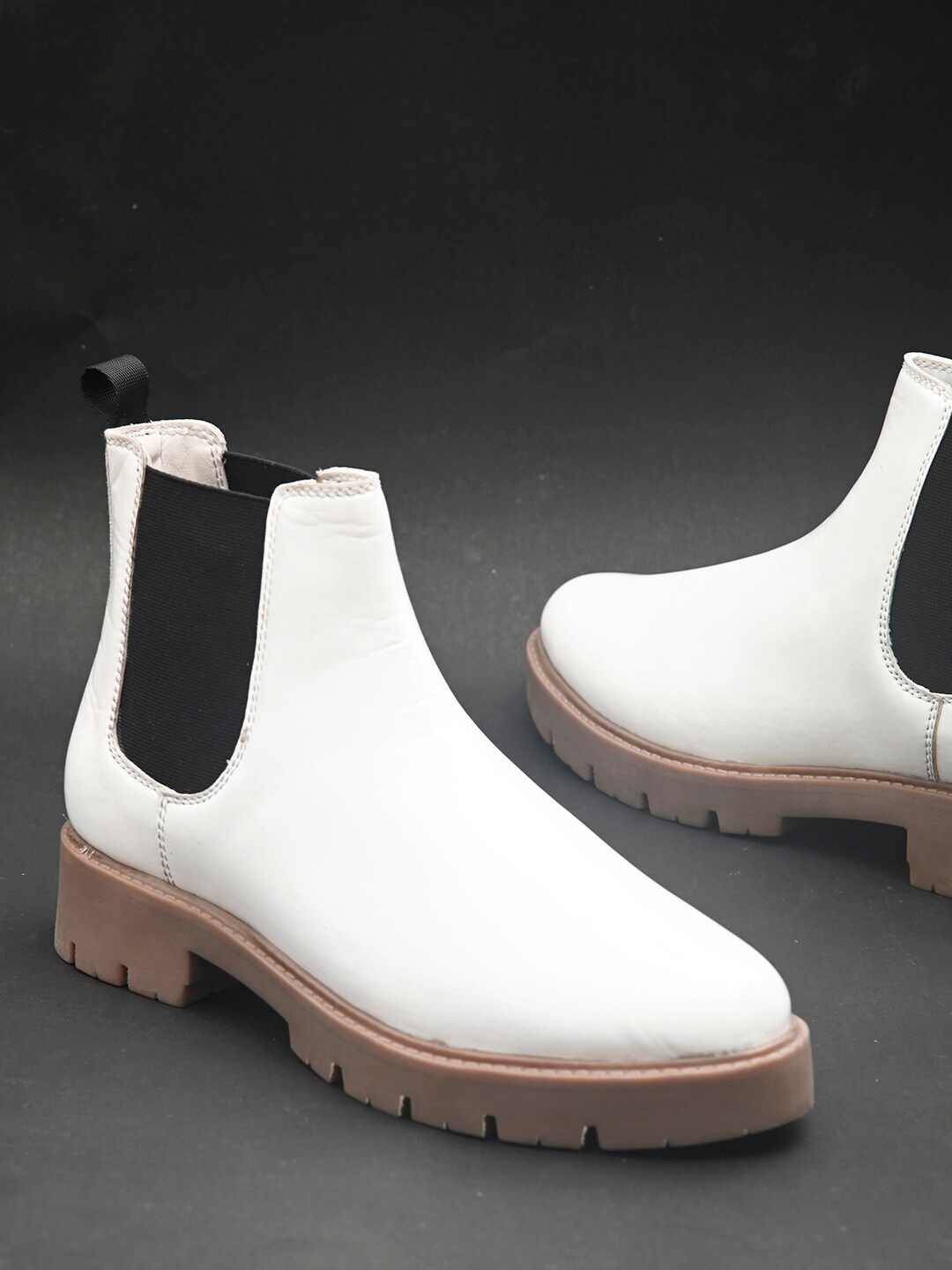

DressBerry Women White & Black Colourblocked Faux Leather Chelsea Boots