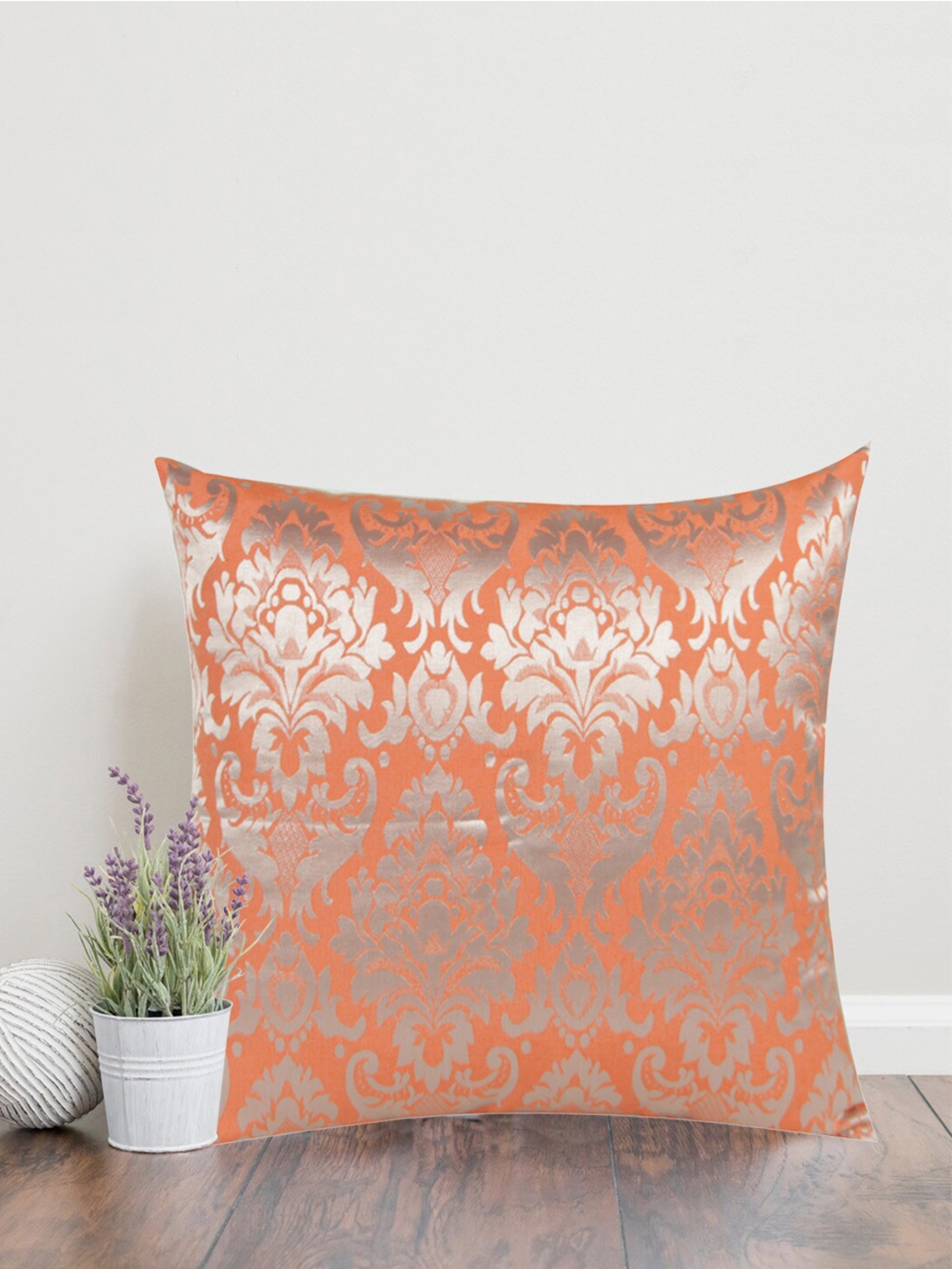 

Home Orange & Silver-Toned Printed Self Design Square Cushion Covers