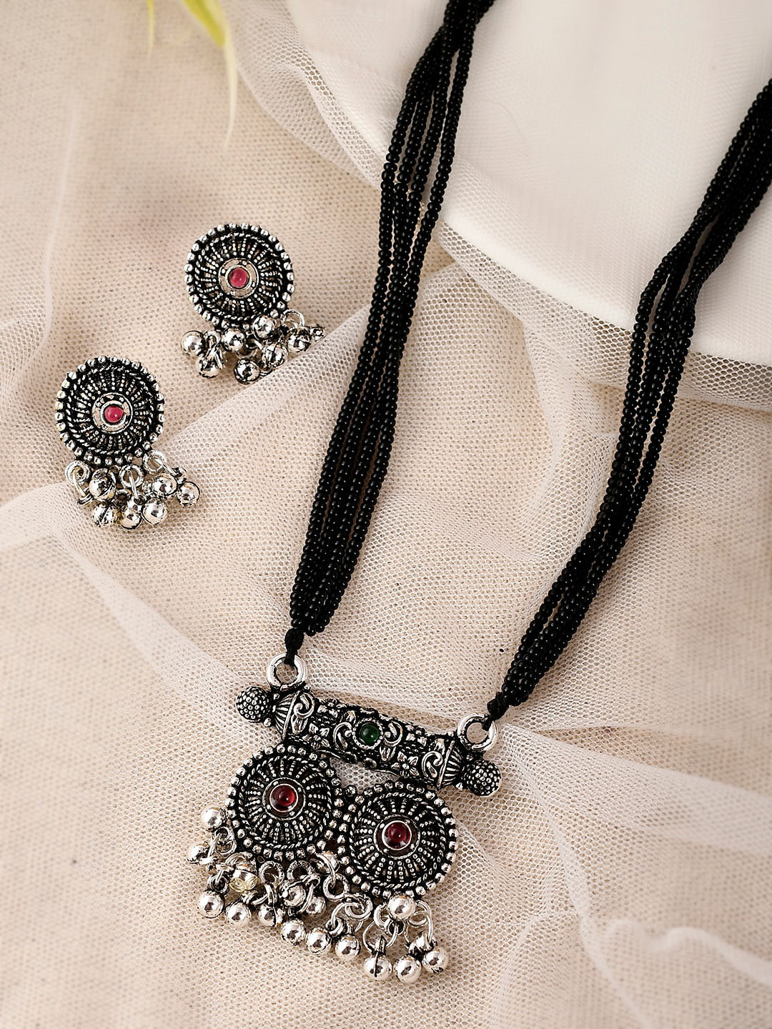 

AQUASTREET JEWELS Silver-Plated Black Artificial Stone Studded & Beaded Mangalsutra With Earrings