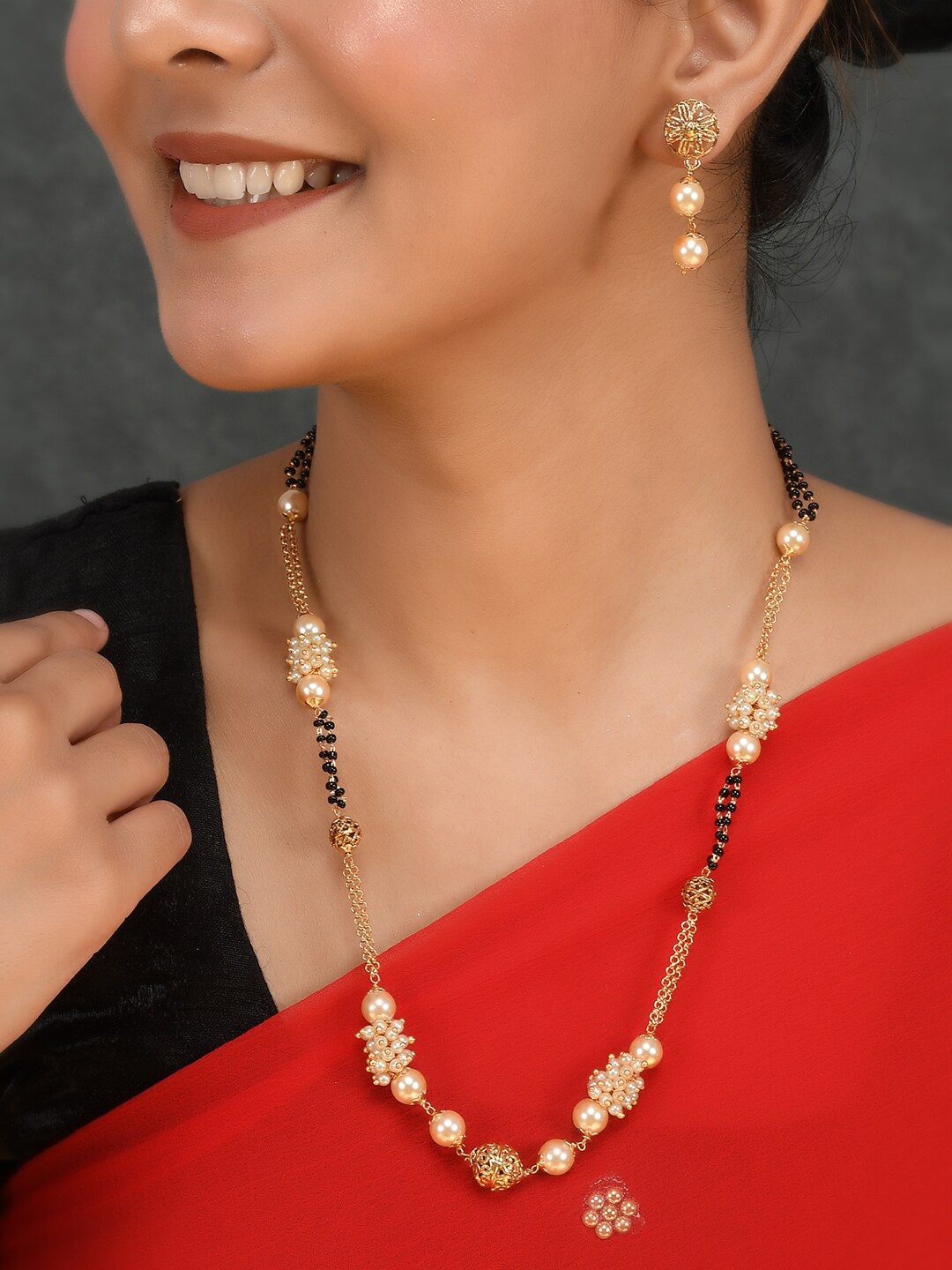 

AQUASTREET JEWELS Gold-Plated Black Beaded Mangalsutra With Earrings