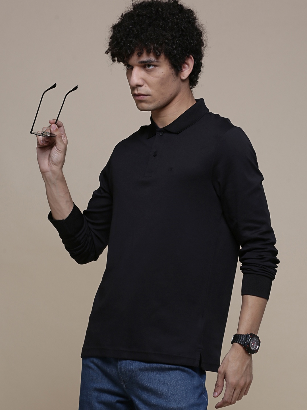 

Calvin Klein Jeans Men Black Solid Pure Cotton Slim Fit T-shirt
