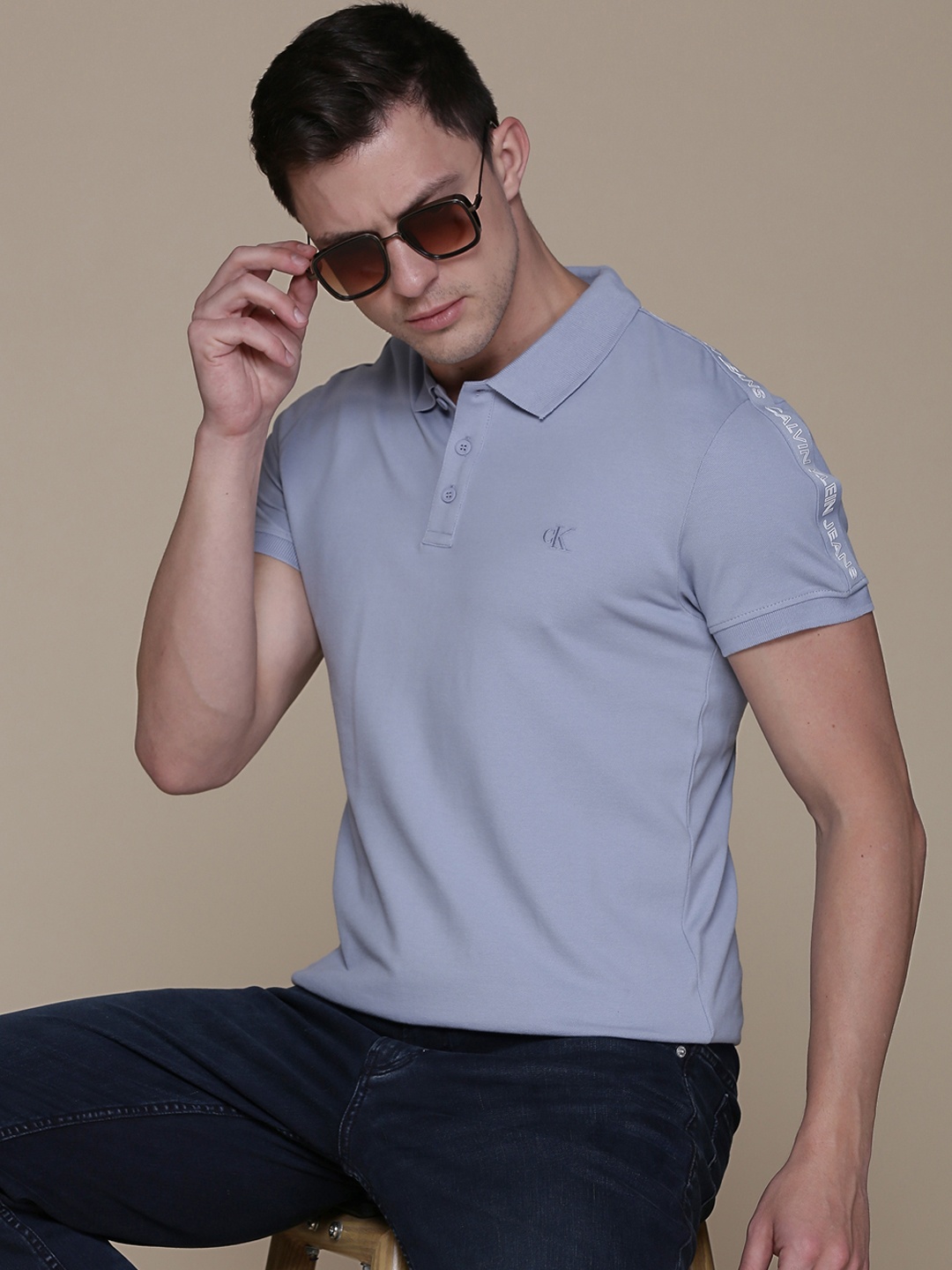 

Calvin Klein Jeans Men Blue Solid Pure Cotton Slim Fit T-shirt