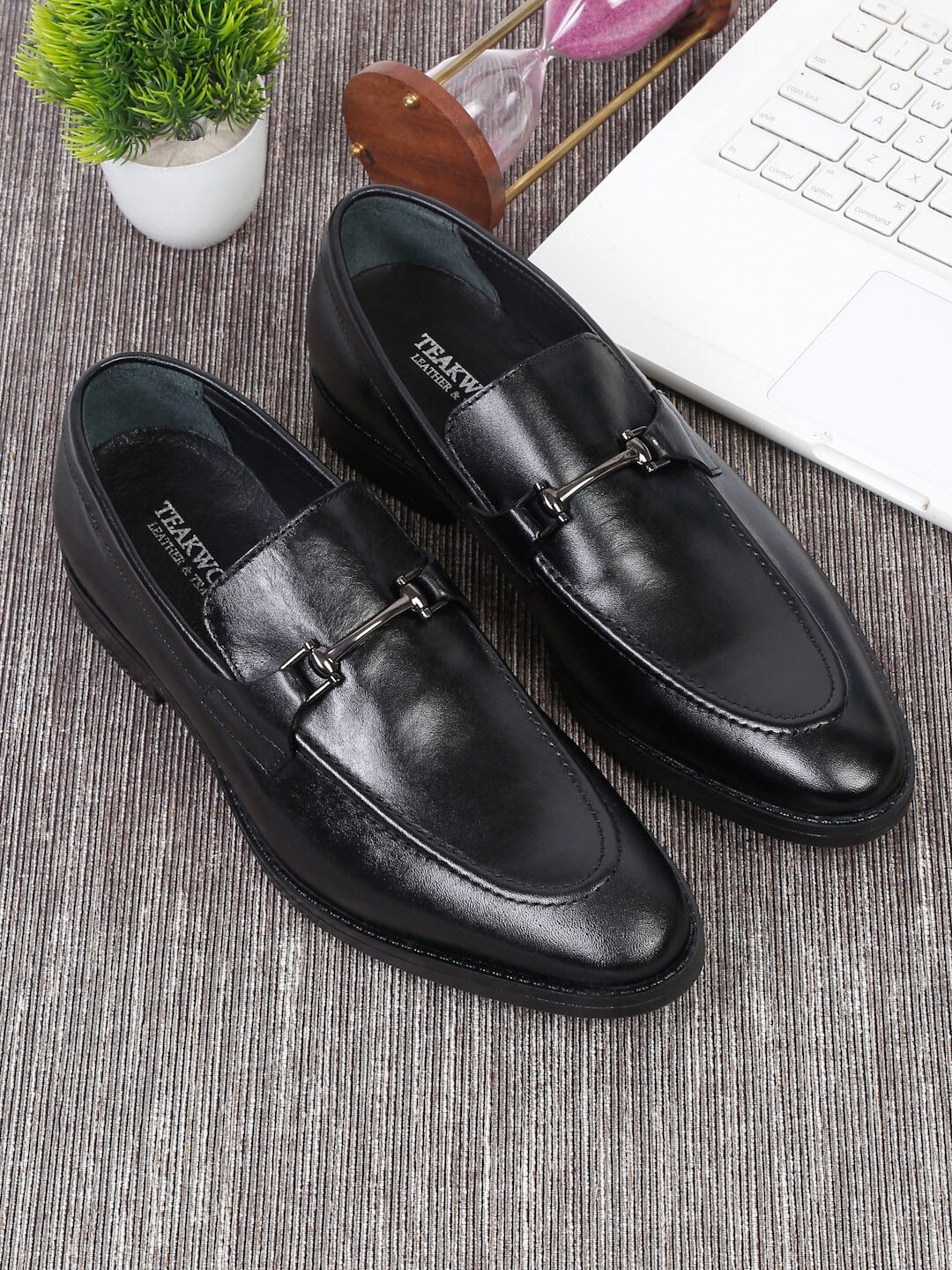 

Teakwood Leathers Men Black Solid Leather Slip-On Formal Shoes