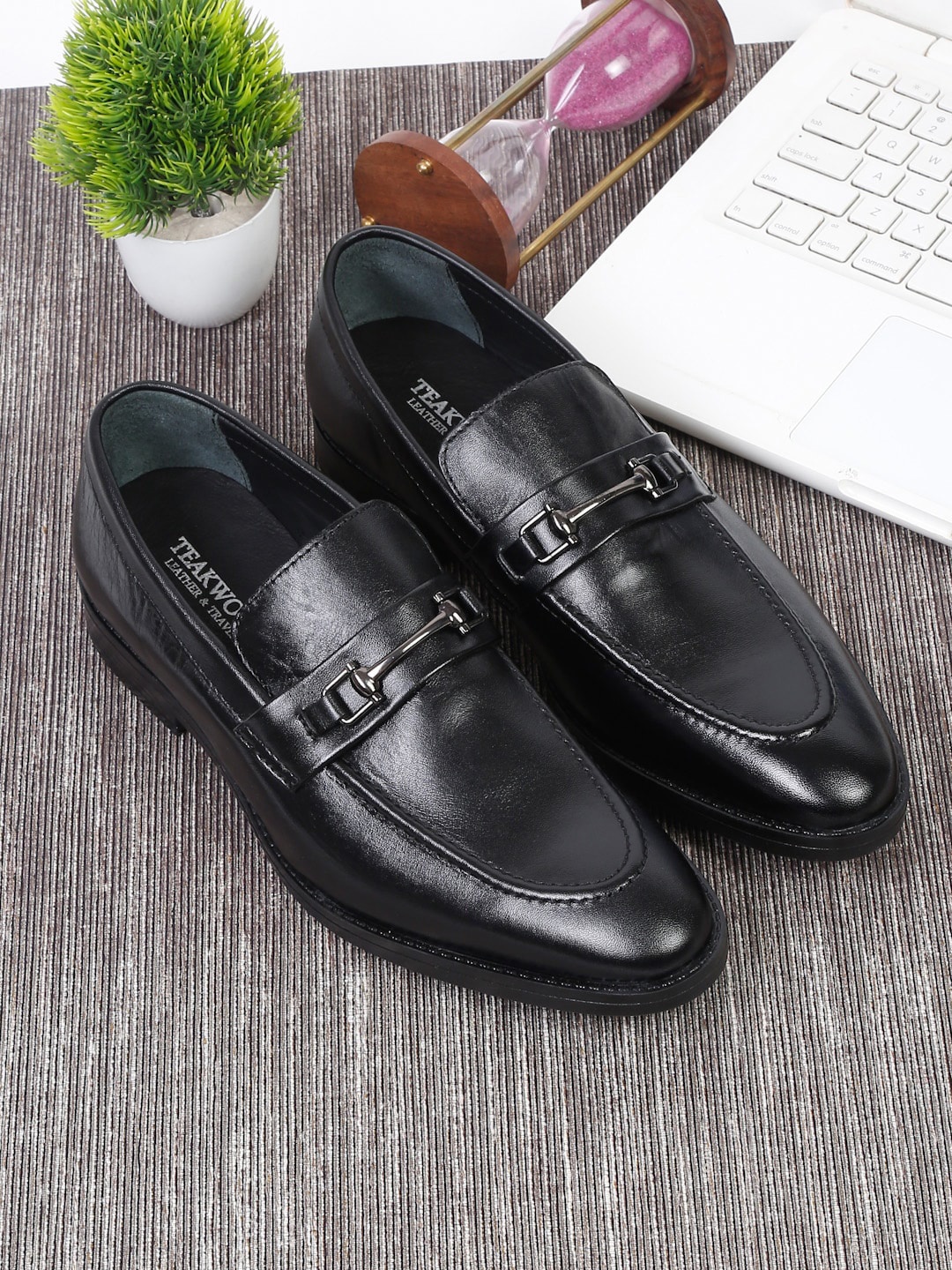 

Teakwood Leathers Men Black Solid Leather Formal Loafers