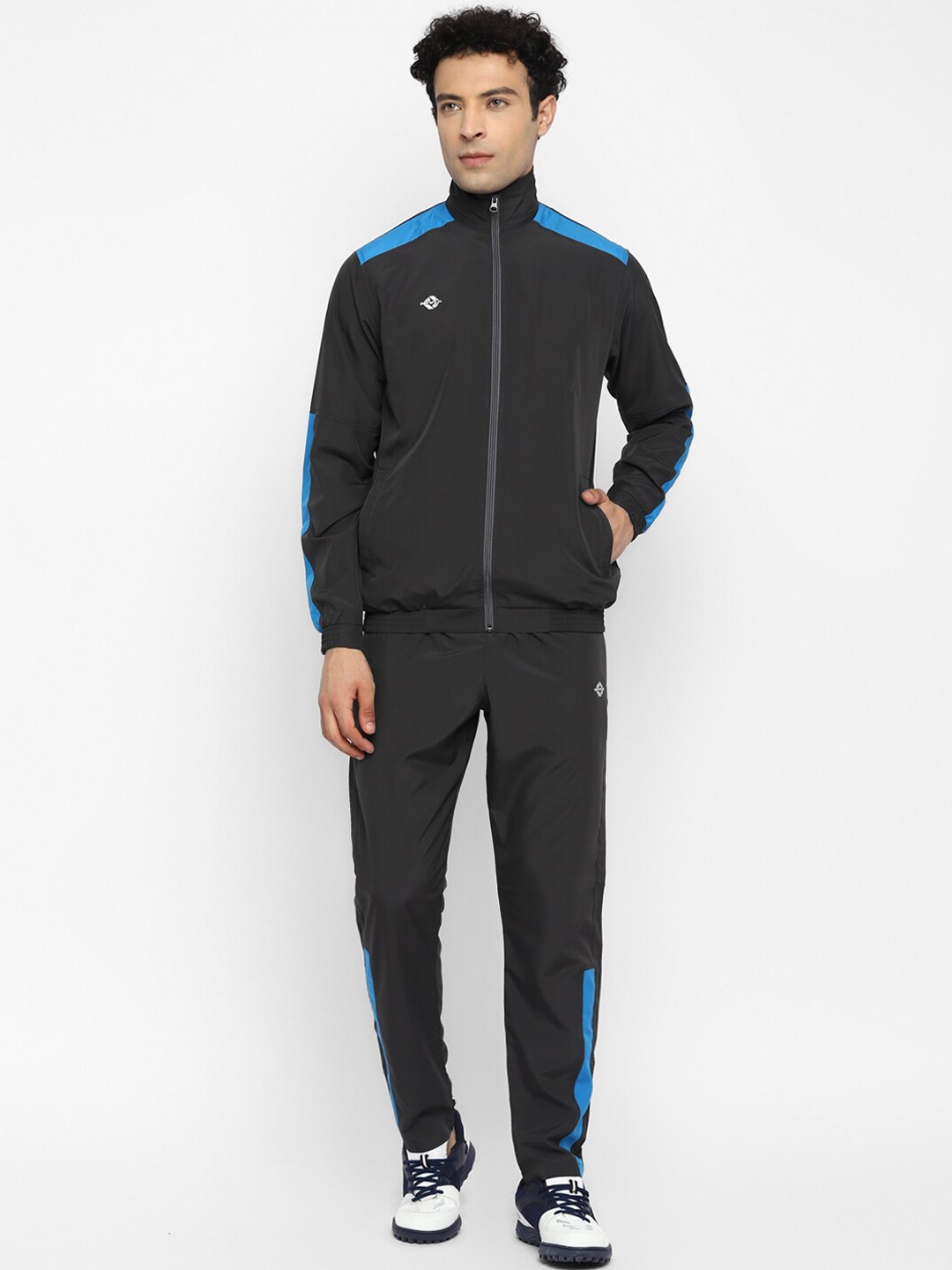

NIVIA Men Grey & Blue Solid Tracksuits