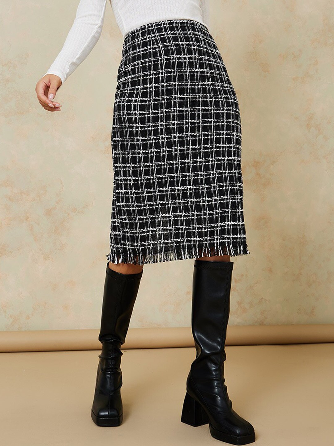 

Styli Women Black & White Checked Midi Pencil Skirt with Frayed Hemline