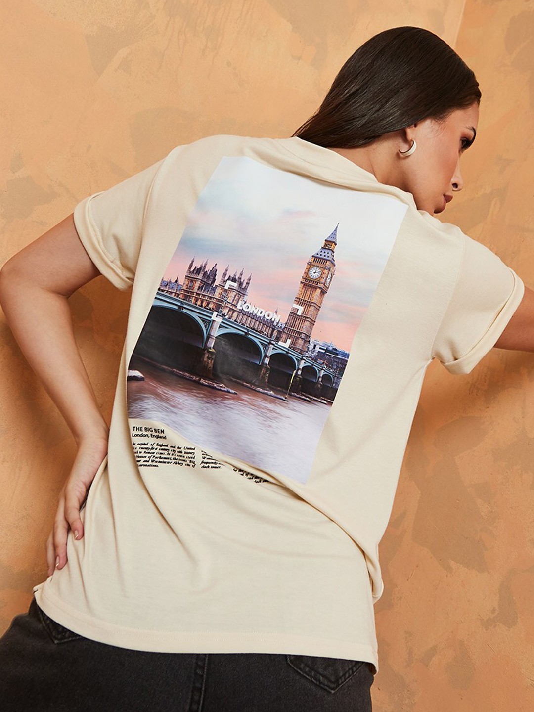 

Styli Women London Big Ben Graphic Printed Oversized Longline T-Shirt, Beige