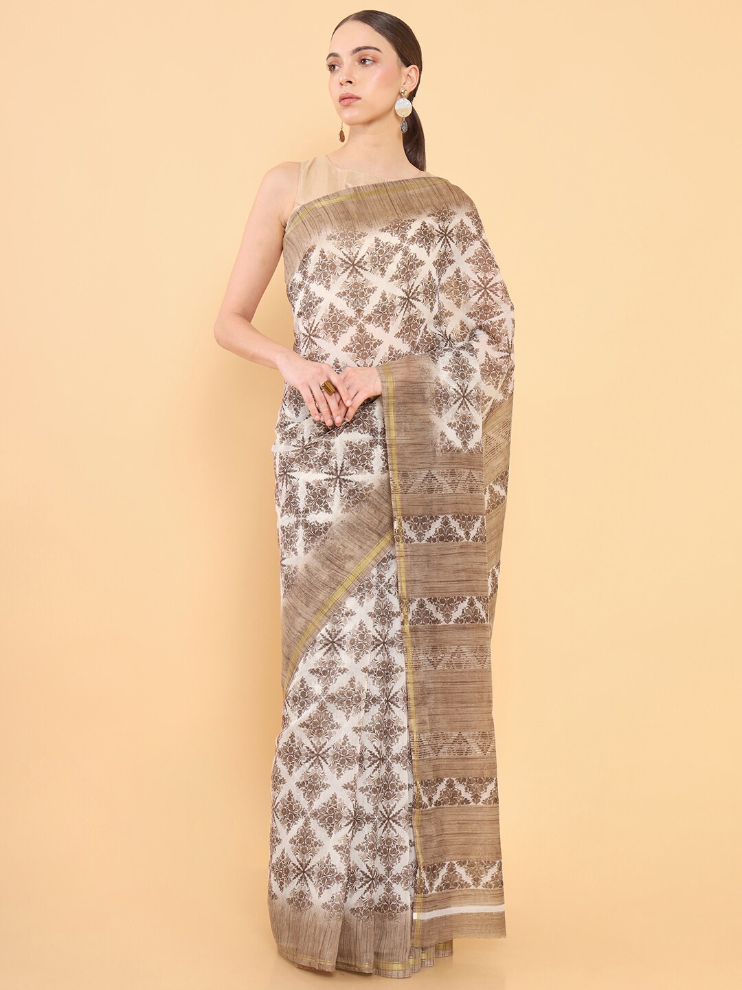 

Soch Brown & White Silk Blend Saree