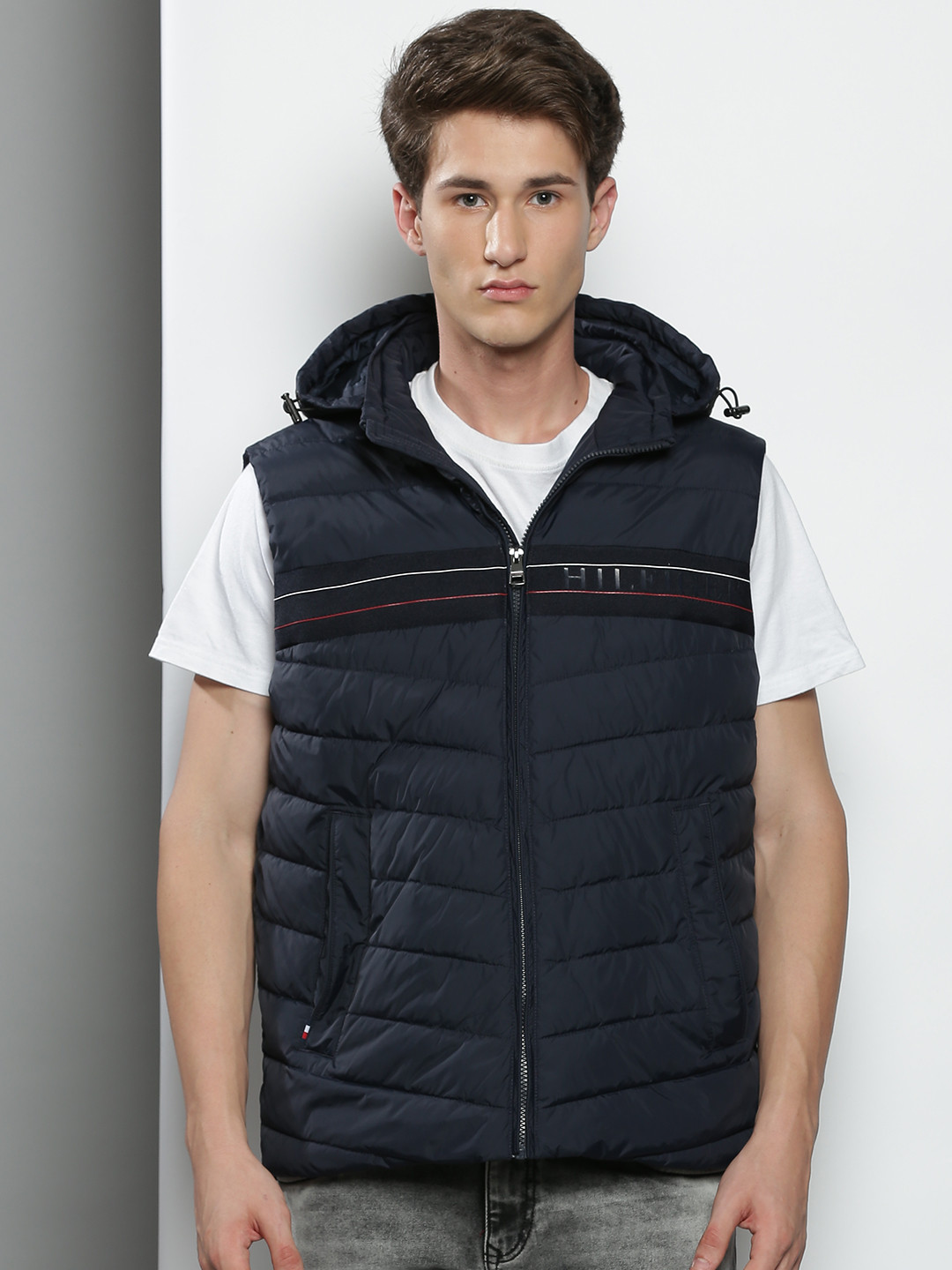 

Tommy Hilfiger Men Brand Logo Striped Sleeveless Puffer Hooded Jacket, Navy blue