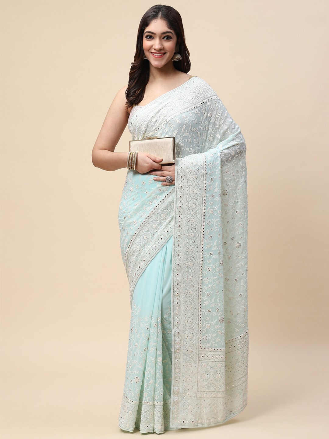 

Meena Bazaar Women Sea Green & White Embellished Embroidered Saree