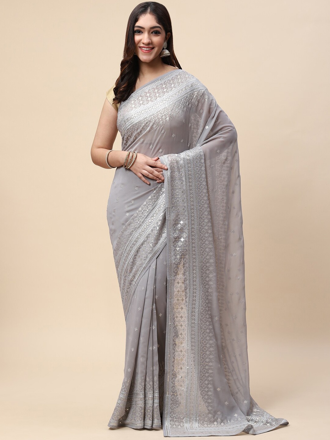

Meena Bazaar Grey & White Floral Embroidered Saree