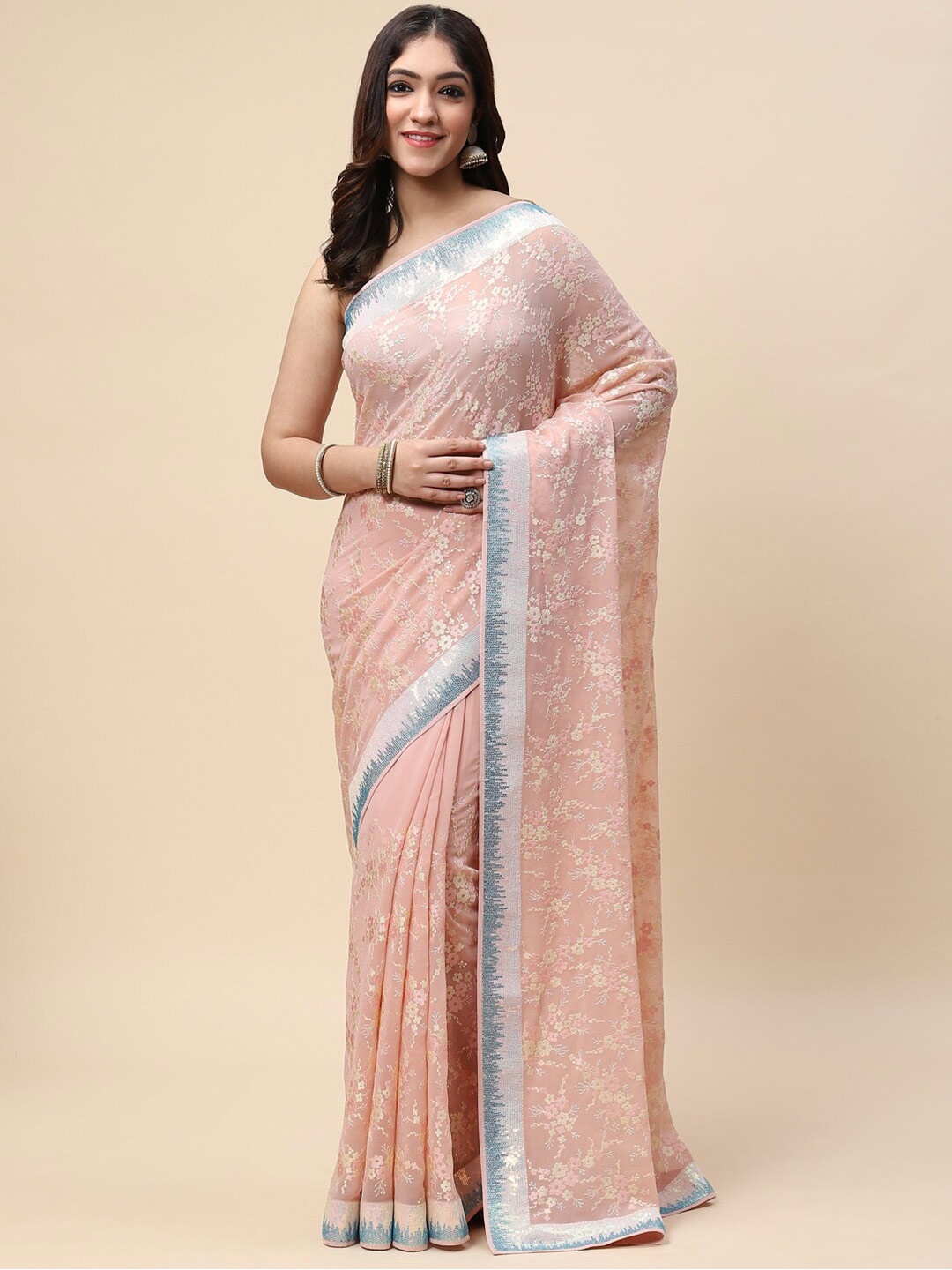 

Meena Bazaar Peach-Coloured & Blue Floral Embroidered Saree