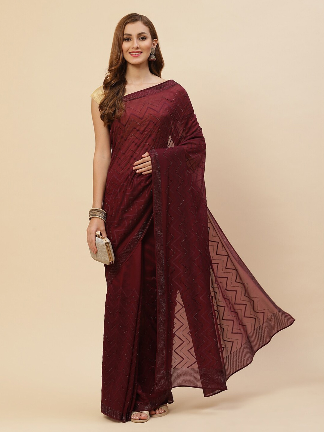 

Meena Bazaar Burgundy & Silver-Toned Embellished Poly Georgette Saree